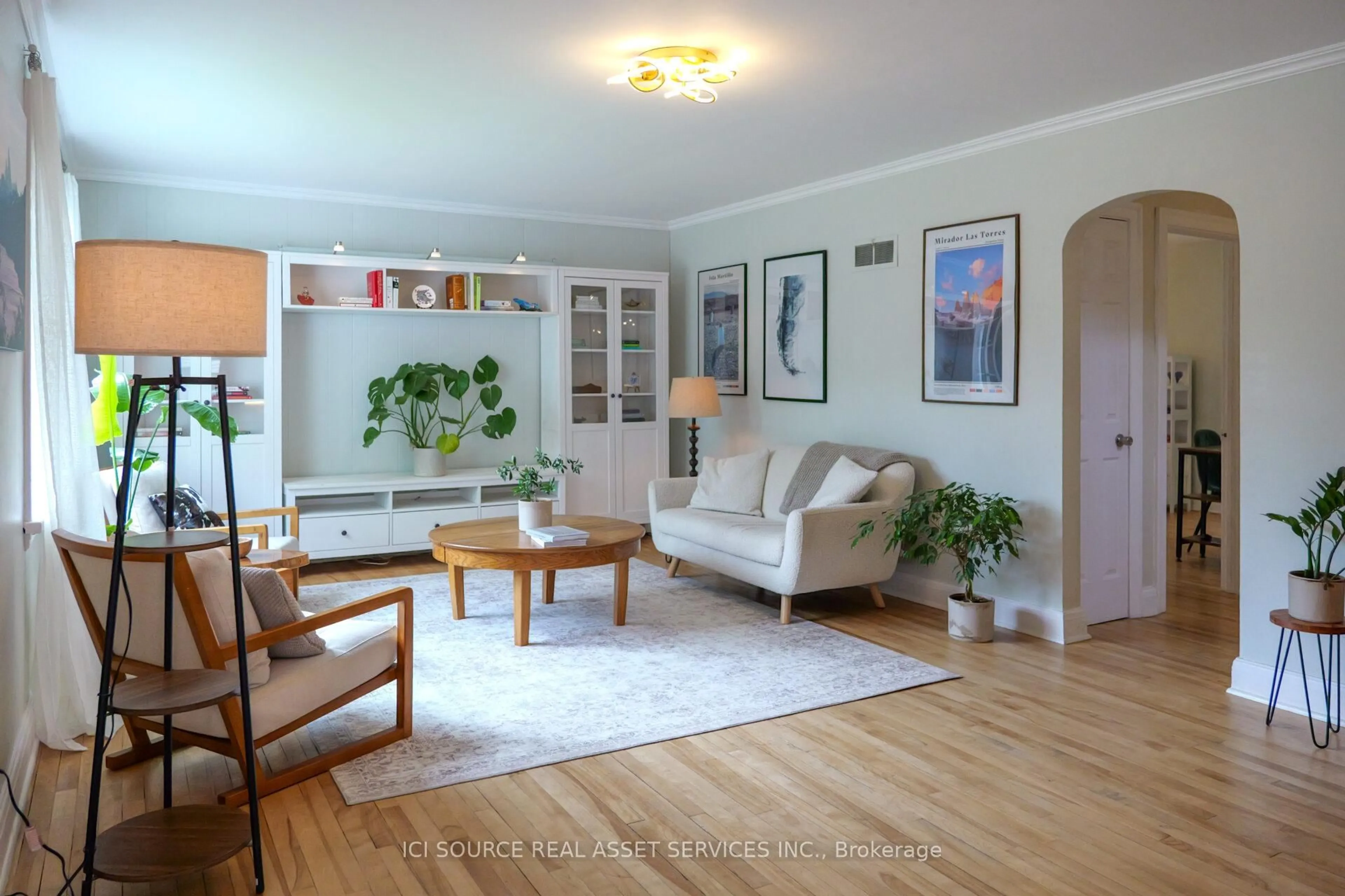 Living room with furniture, wood/laminate floor for 318 Cecelia St, Pembroke Ontario K8A 1S3
