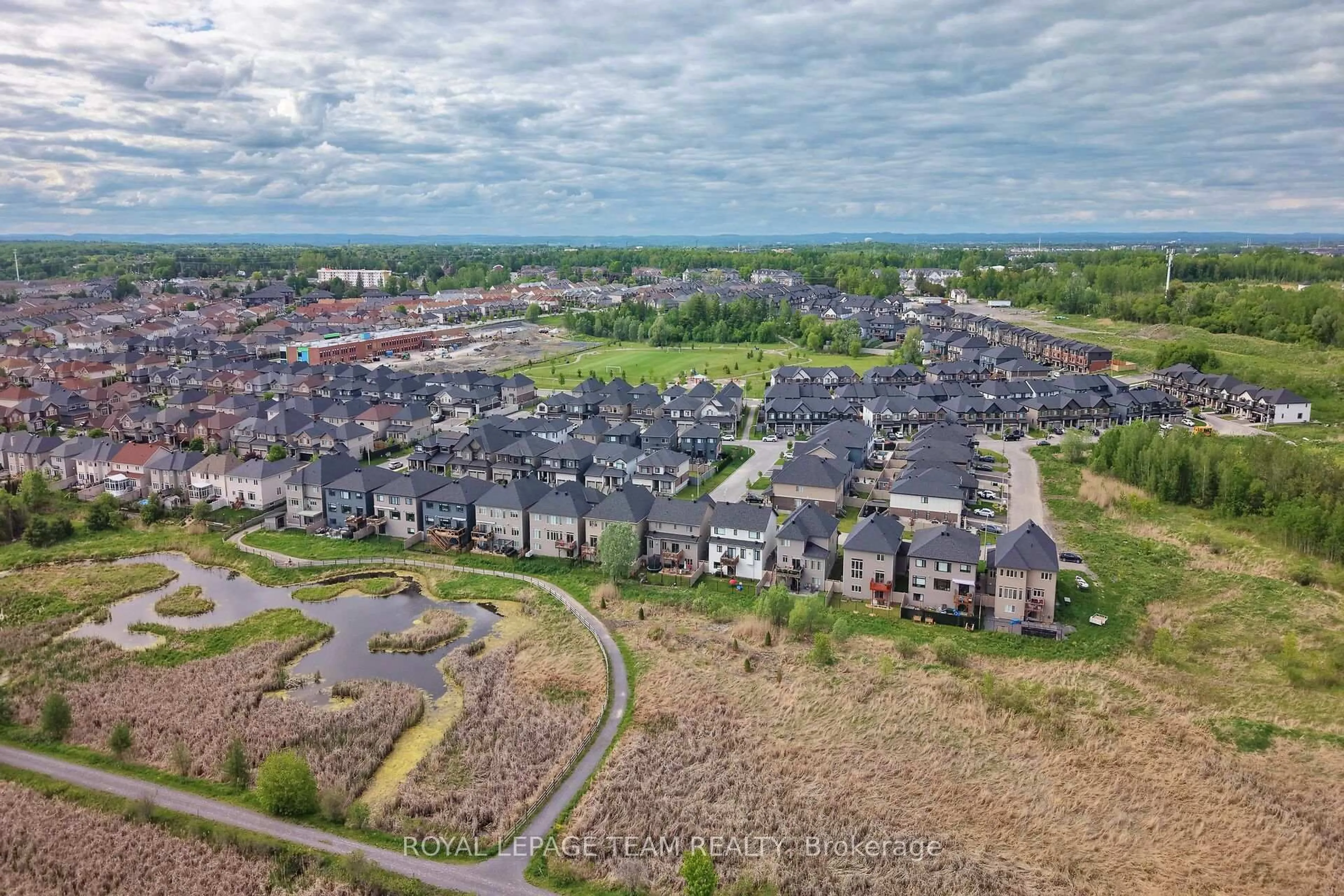 A pic from outside/outdoor area/front of a property/back of a property/a pic from drone, mountain view for 154 Winterhaven Dr, Orleans Ontario K1W 0P1