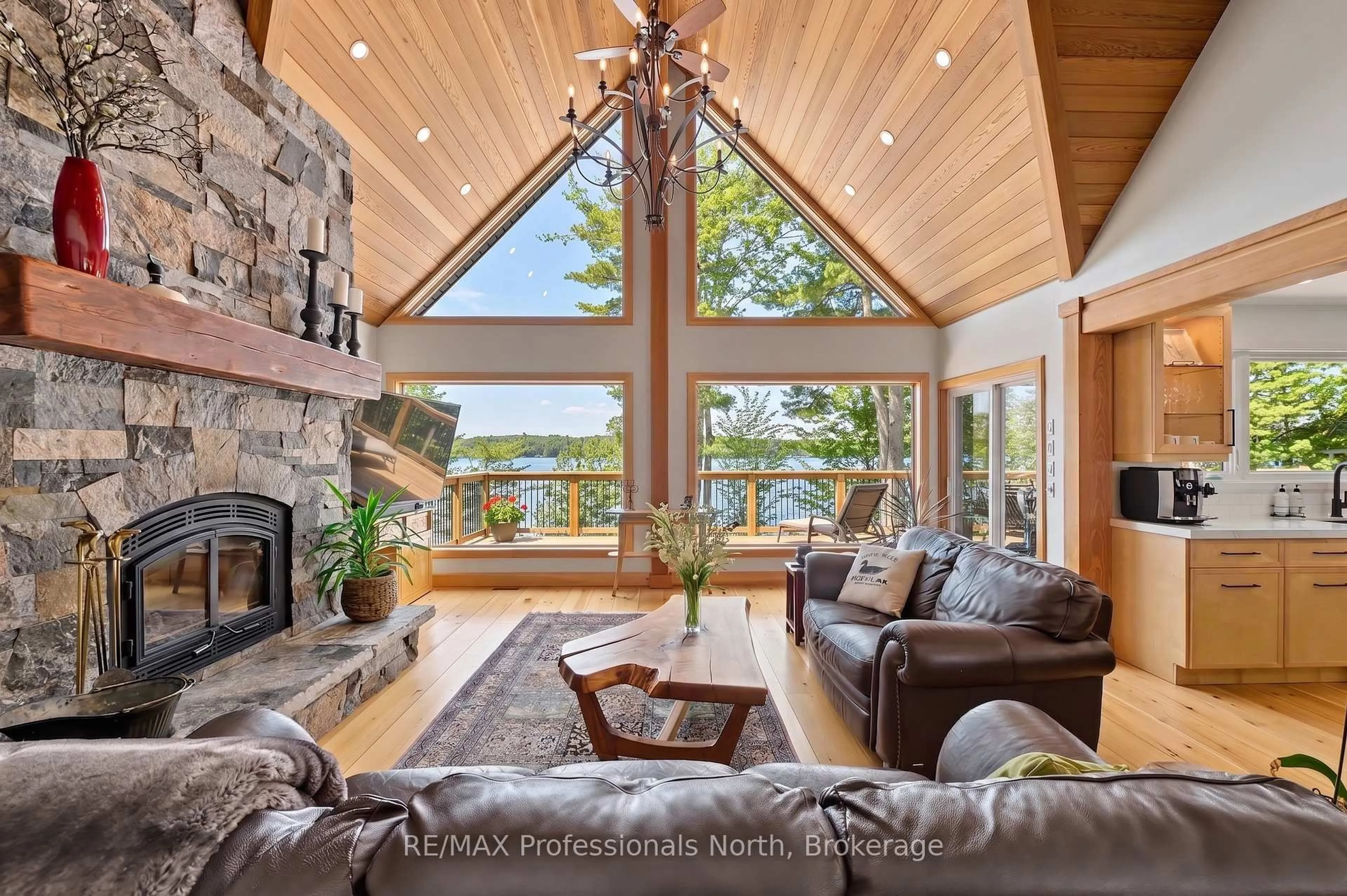 Living room with furniture, wood/laminate floor for 1015 Bluestone Lane, Minden Hills Ontario K0M 2K0