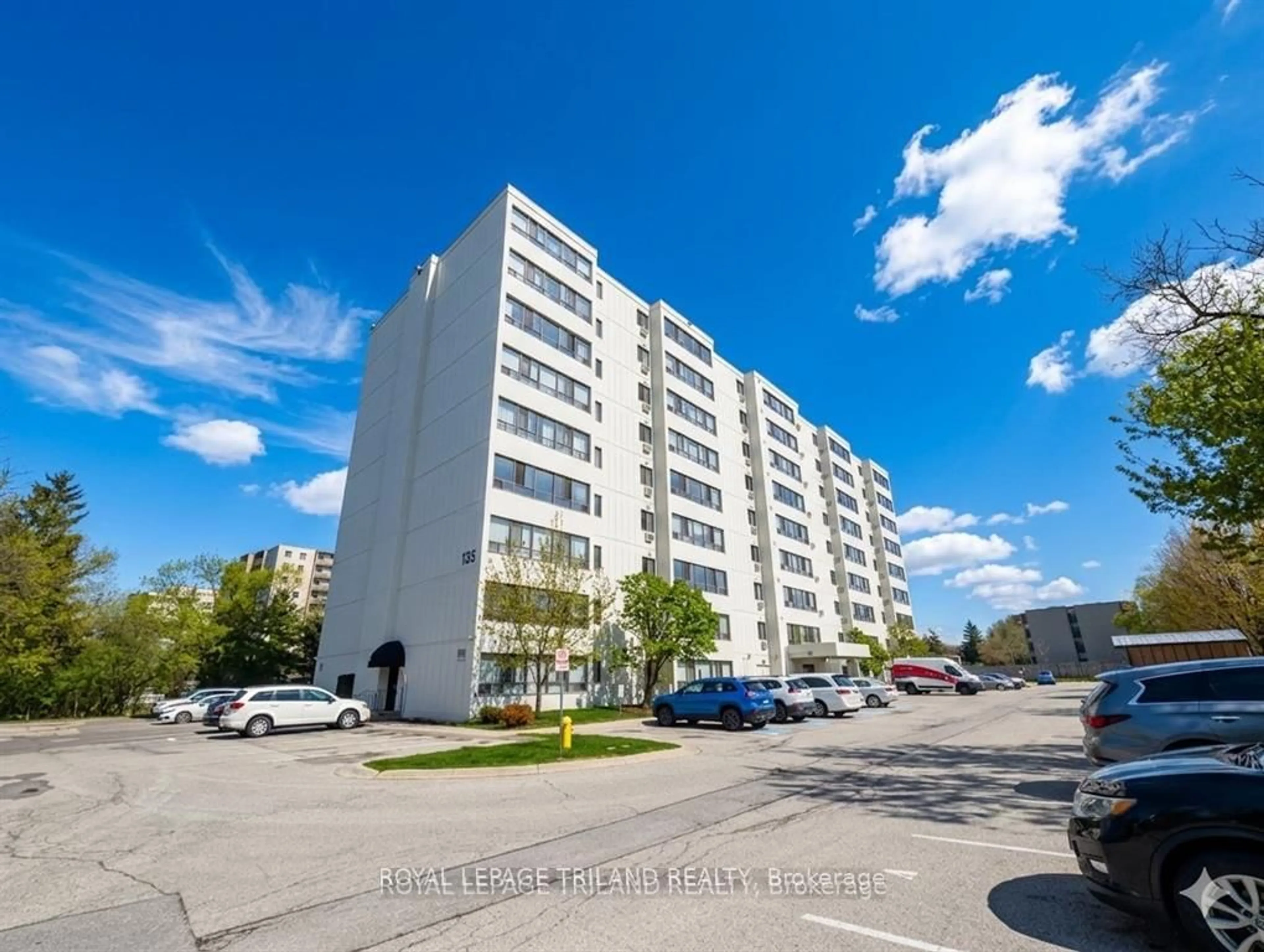A pic from outside/outdoor area/front of a property/back of a property/a pic from drone, street for 135 Base Line Rd #306, London South Ontario N6J 4W4