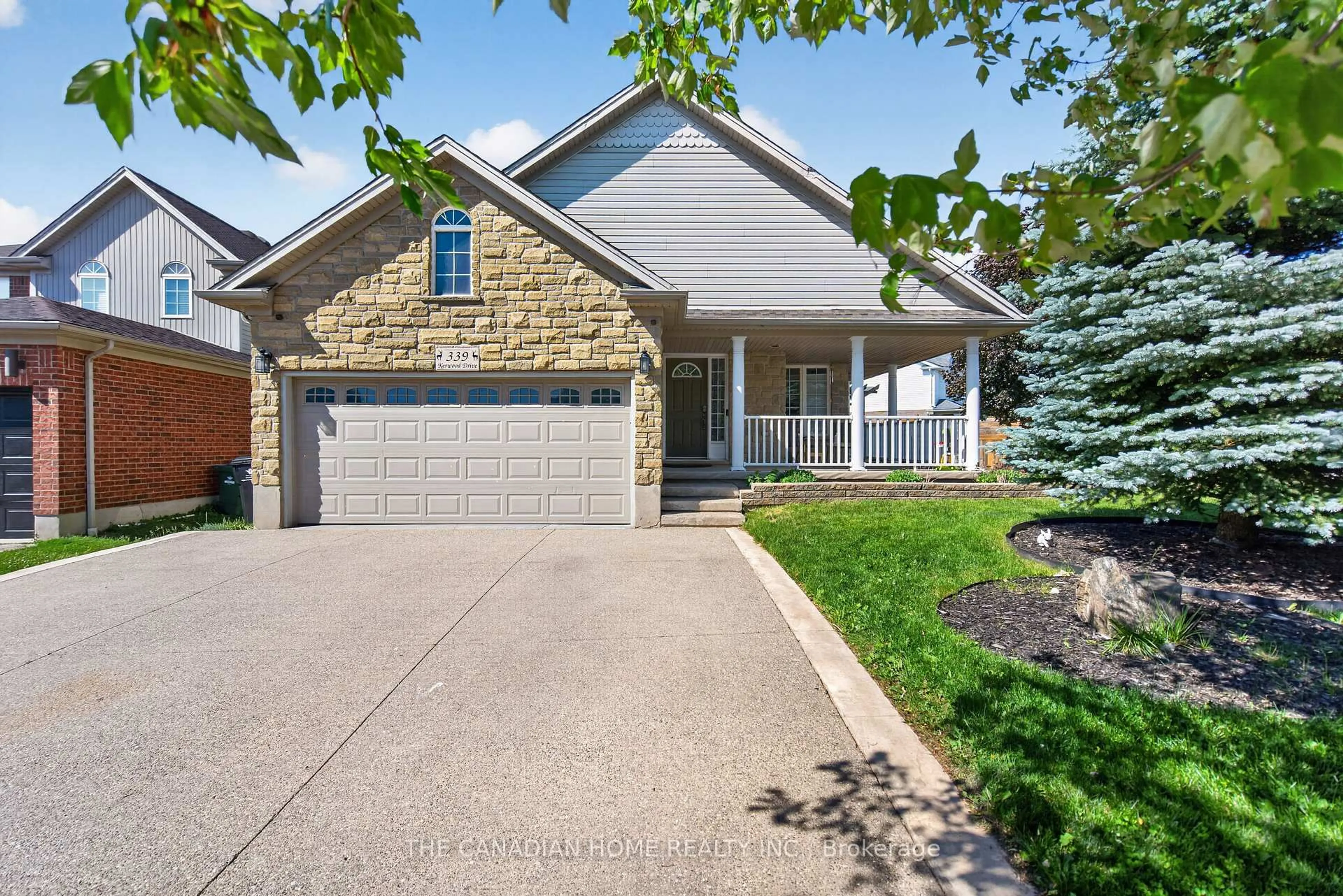 Home with brick exterior material, street for 339 Kerwood Dr, Cambridge Ontario N3C 4M2