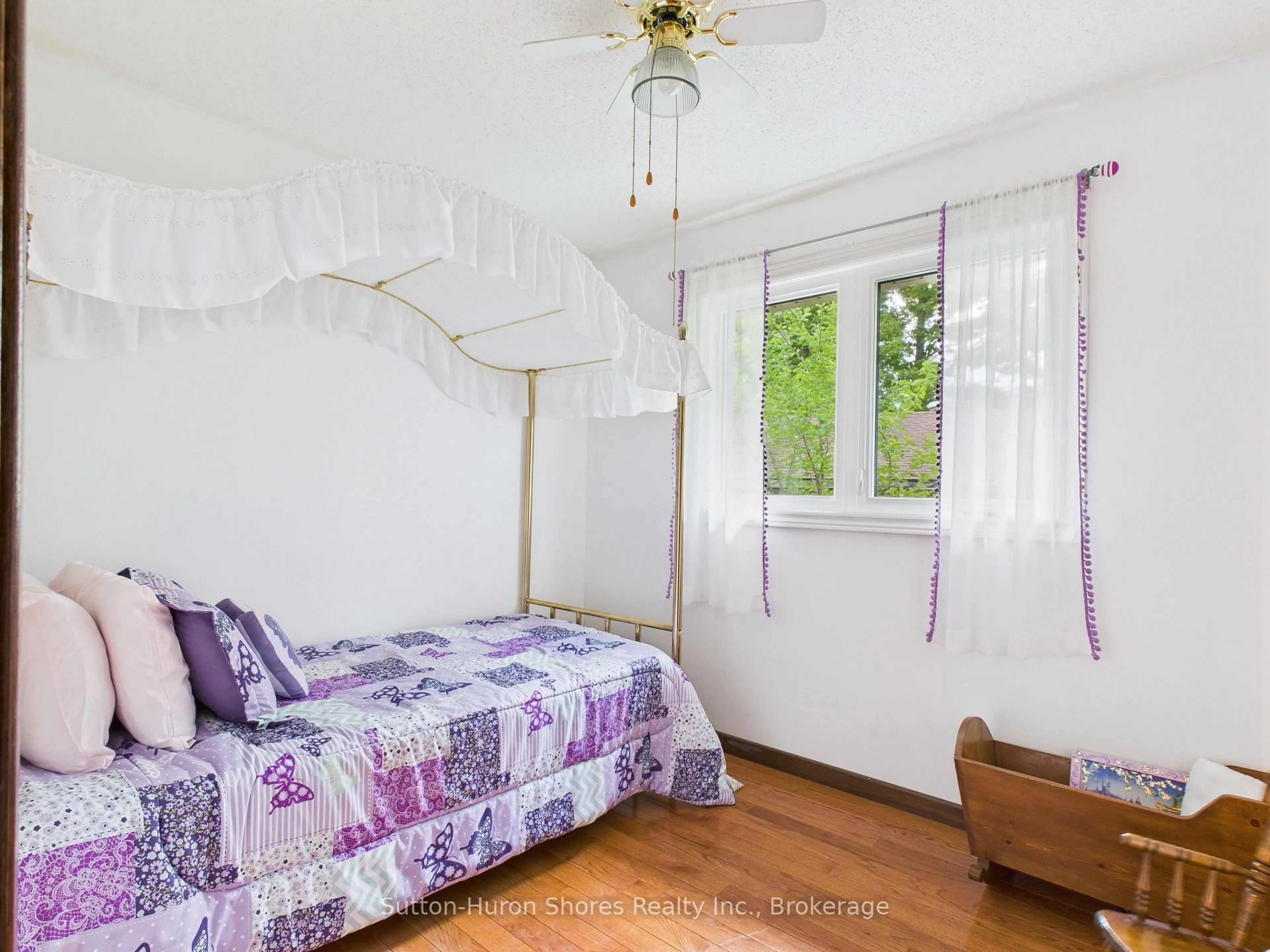 Bedroom with bed, wood/laminate floor for 341 Wellington St, Saugeen Shores Ontario N0H 2C4