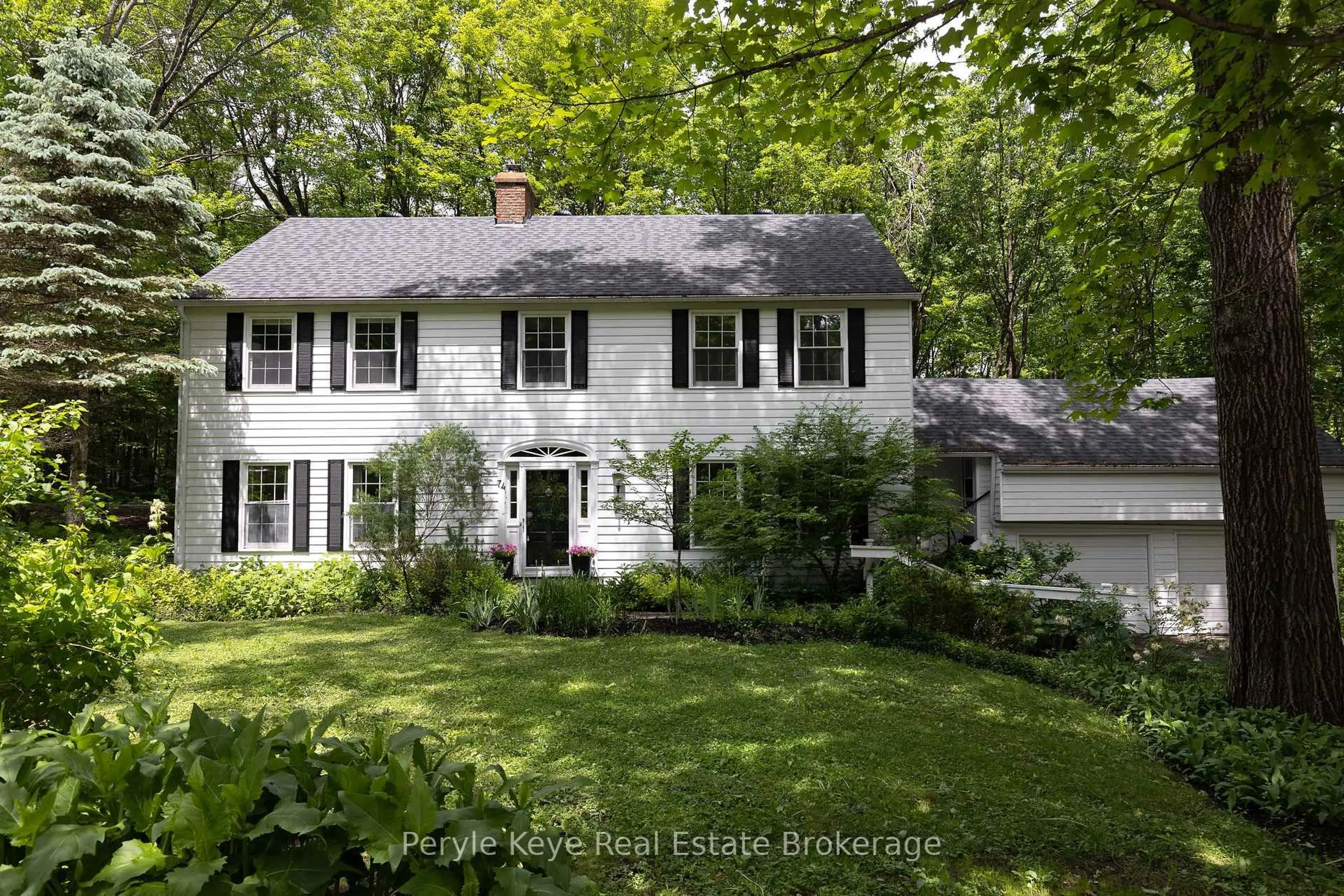 Home with vinyl exterior material, street for 74 Woodland Dr, Bracebridge Ontario P1L 1M2