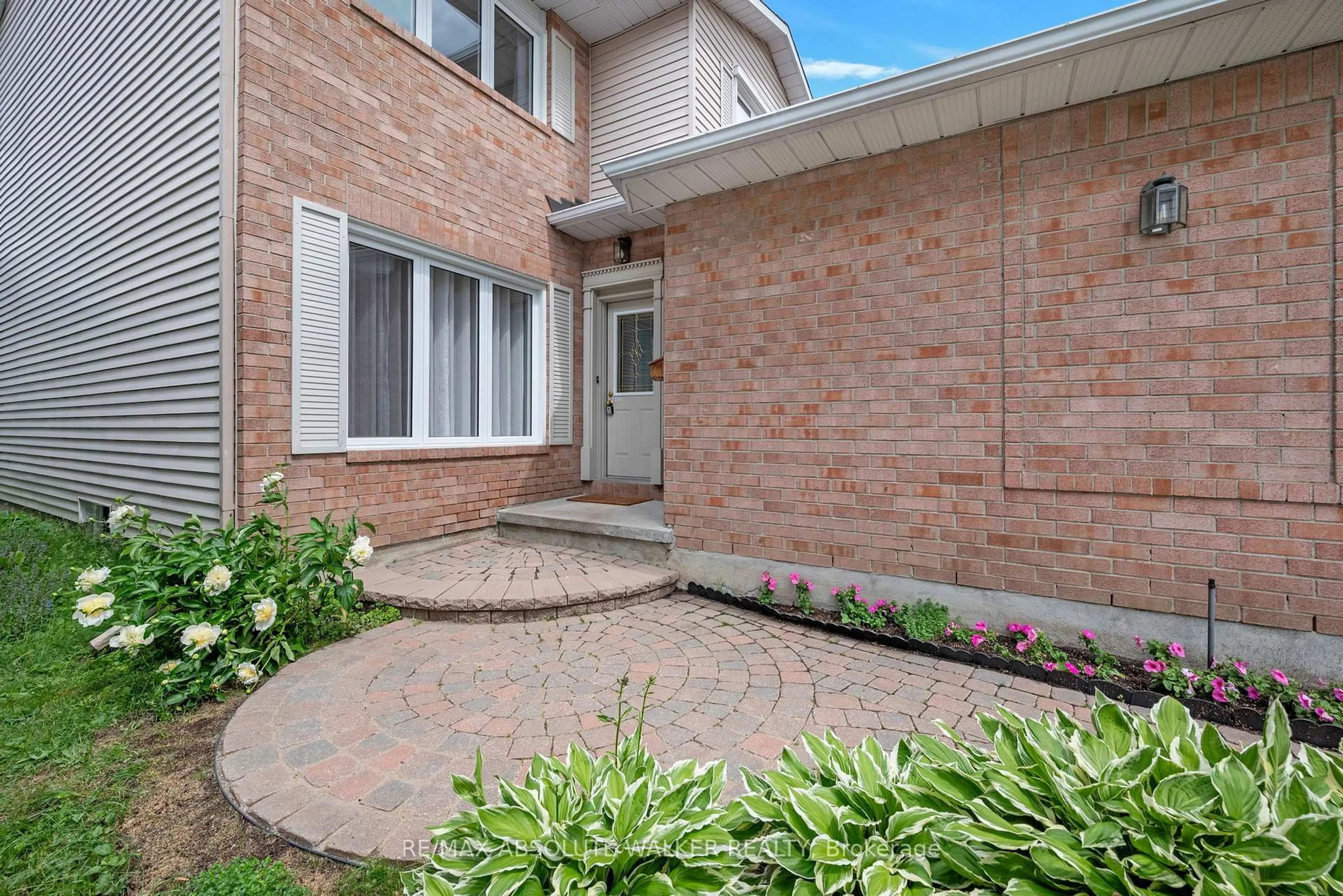 Home with brick exterior material, street for 14 Inwood Dr, Ottawa Ontario K2M 1Z5