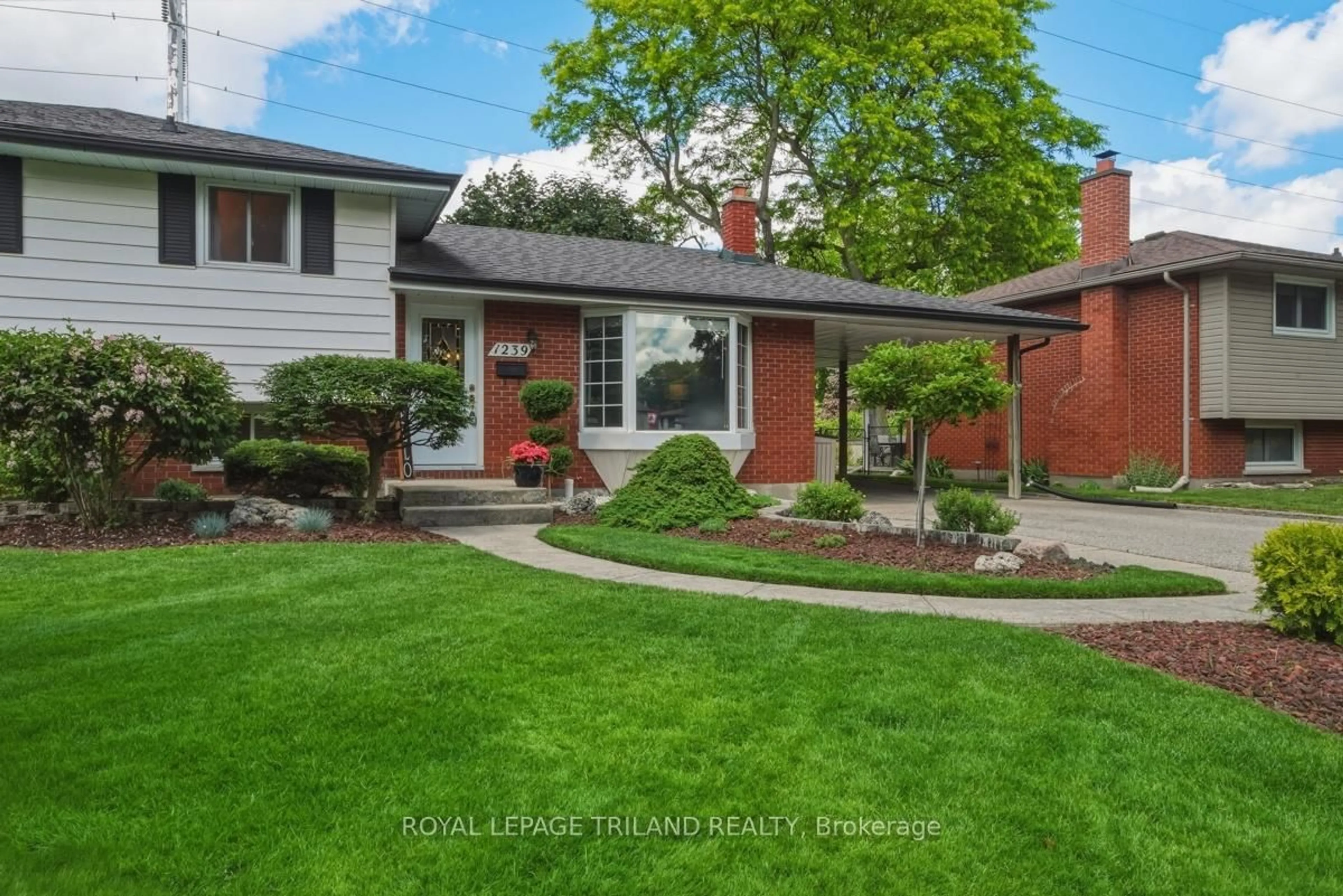Home with brick exterior material, street for 1239 Addison Dr, London East Ontario N5V 2N8