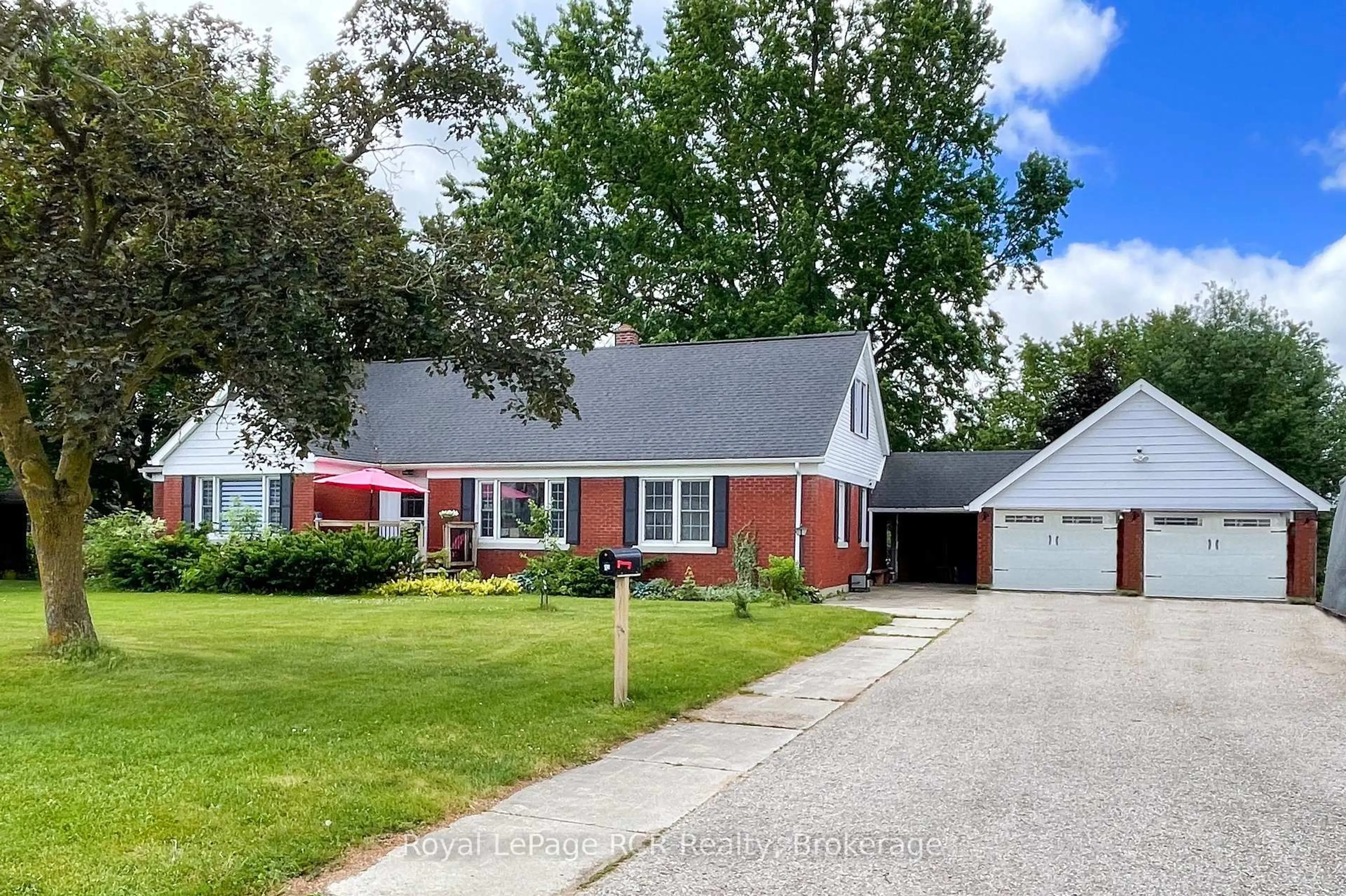 Home with vinyl exterior material, street for 1053 Highway 9, South Bruce Ontario N0G 2J0