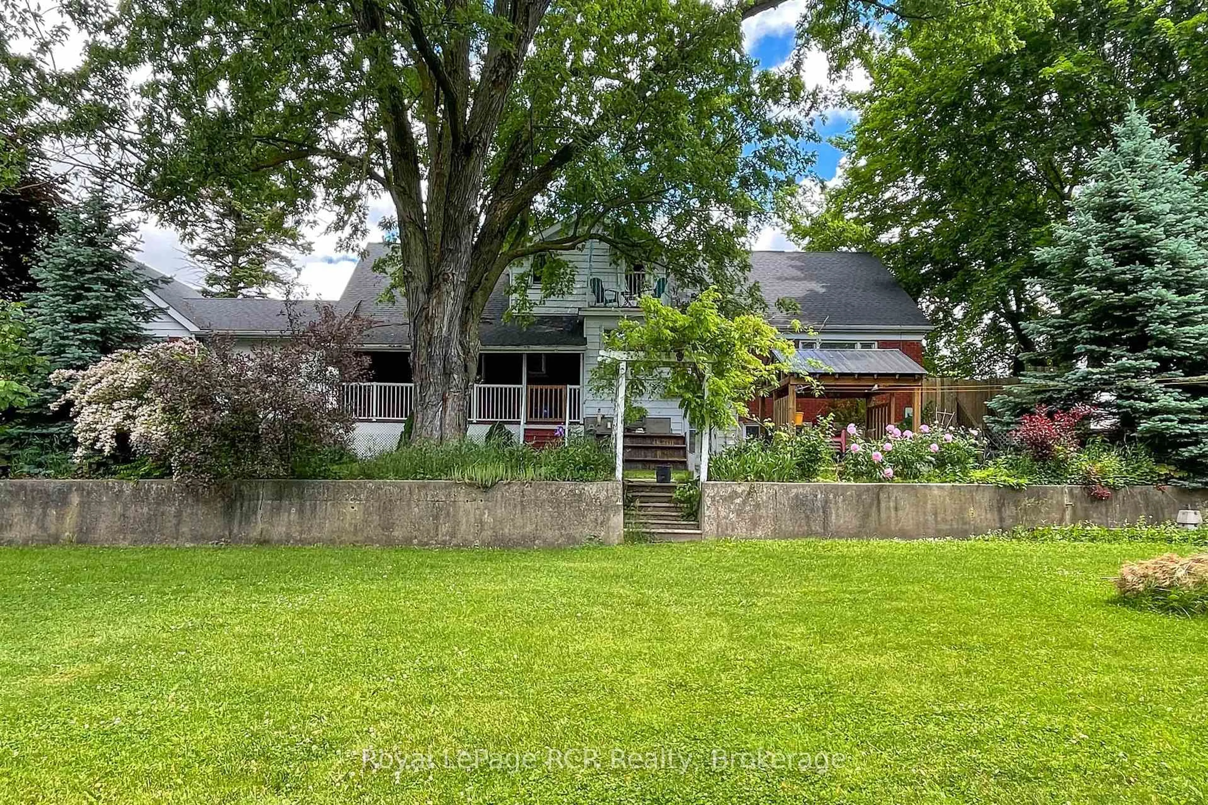 A pic from outside/outdoor area/front of a property/back of a property/a pic from drone, street for 1053 Highway 9, South Bruce Ontario N0G 2J0