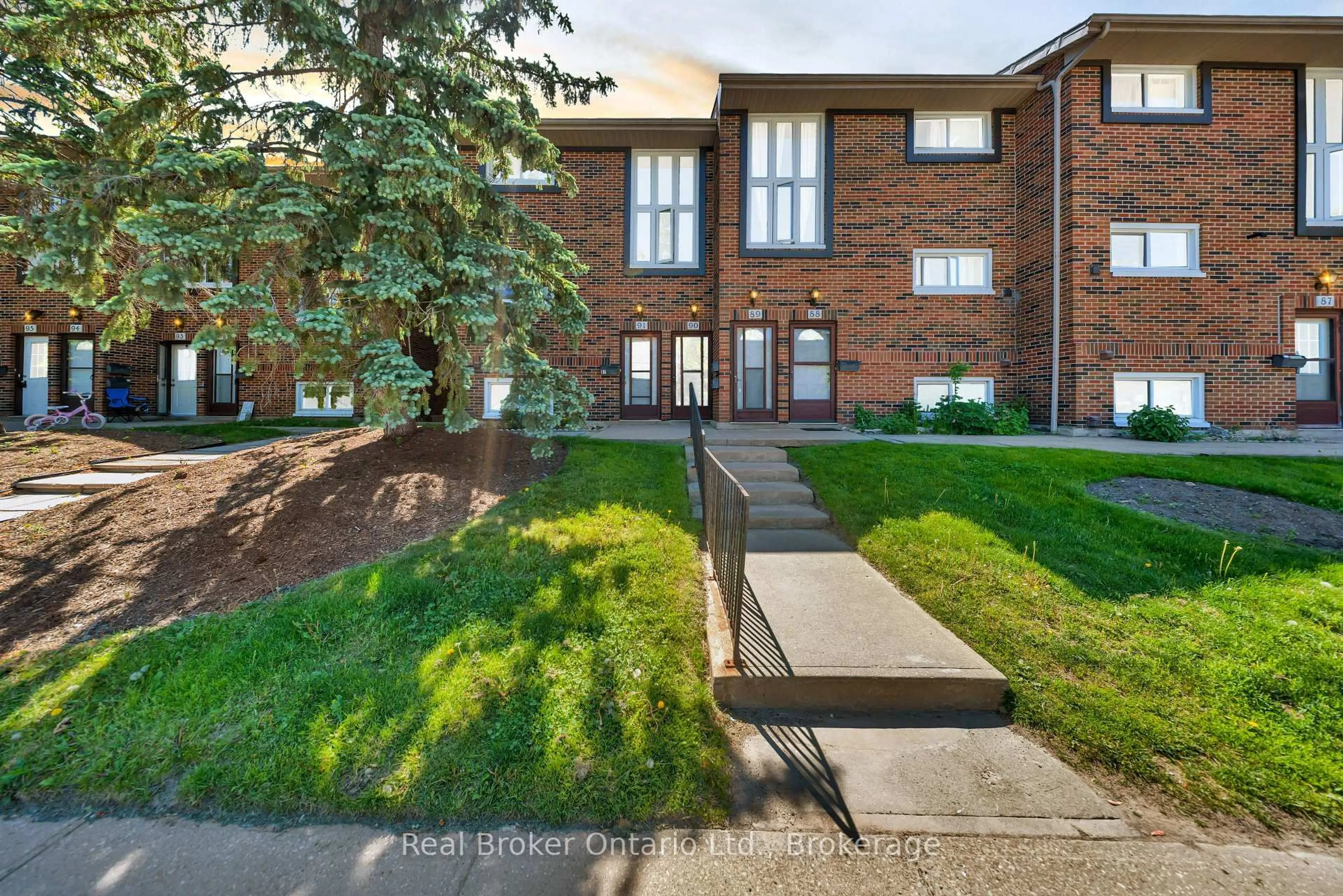 Home with brick exterior material, street for 49 Rhonda Rd #90, Guelph Ontario N1H 7A4