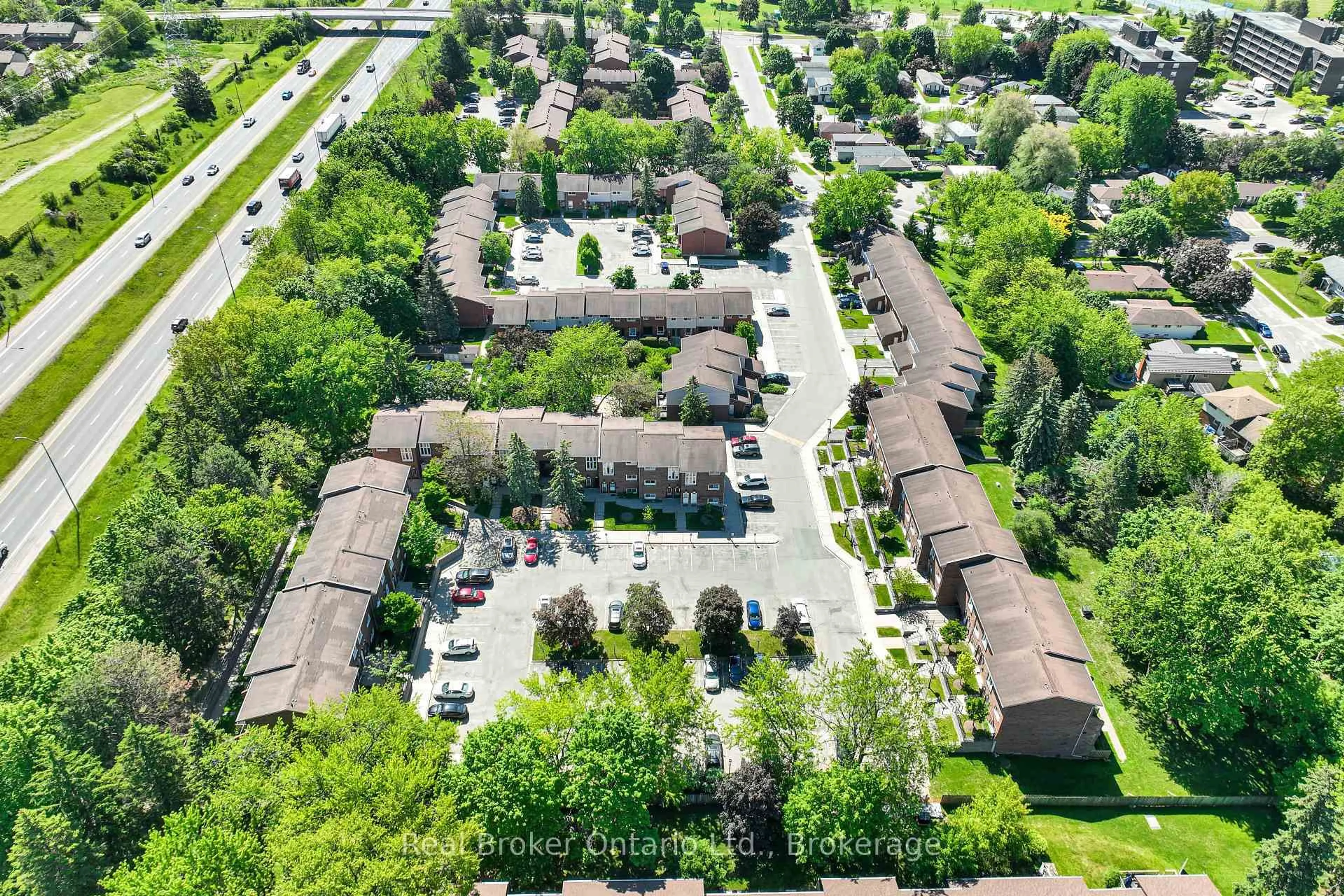 A pic from outside/outdoor area/front of a property/back of a property/a pic from drone, street for 49 Rhonda Rd #90, Guelph Ontario N1H 7A4
