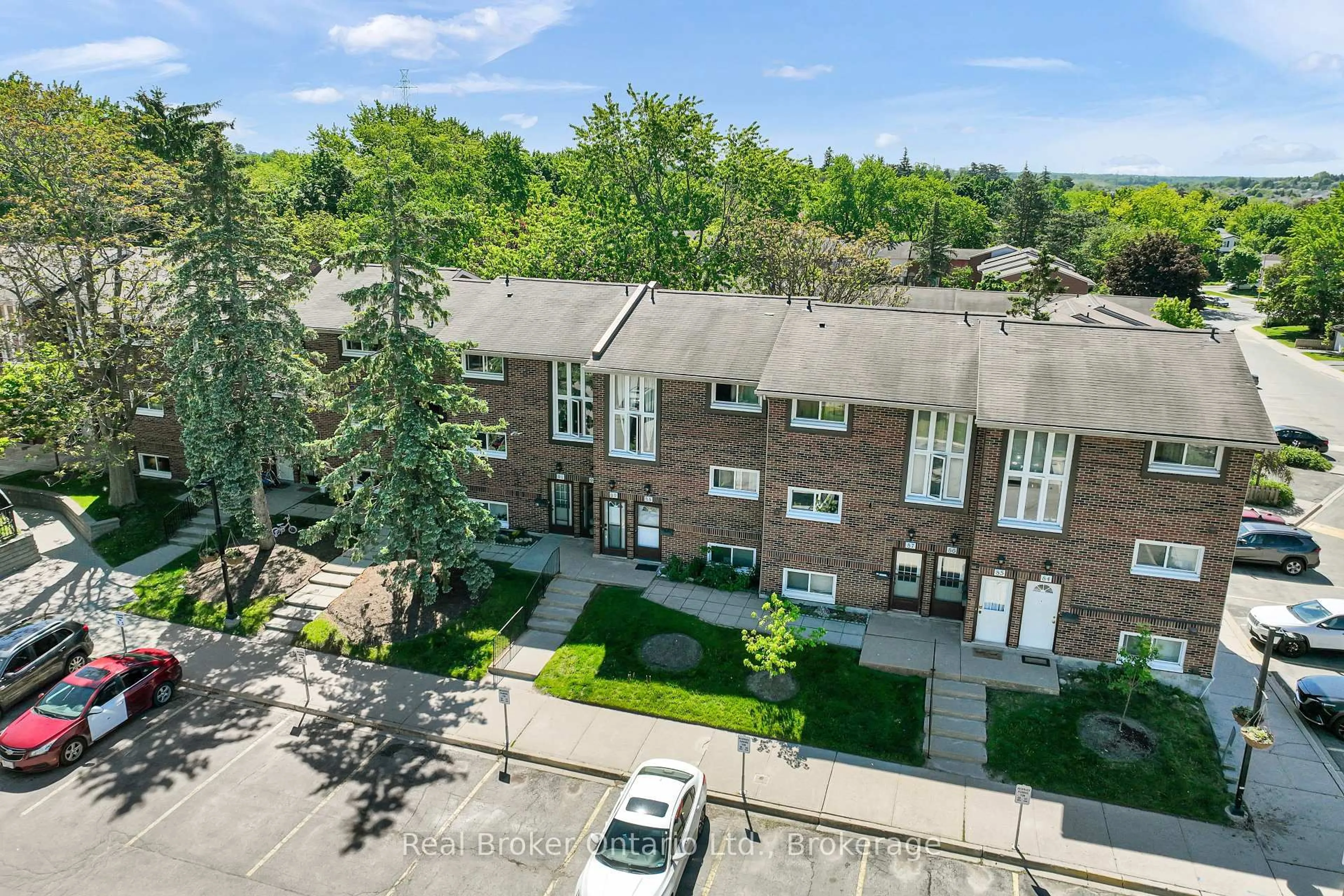 A pic from outside/outdoor area/front of a property/back of a property/a pic from drone, unknown for 49 Rhonda Rd #90, Guelph Ontario N1H 7A4
