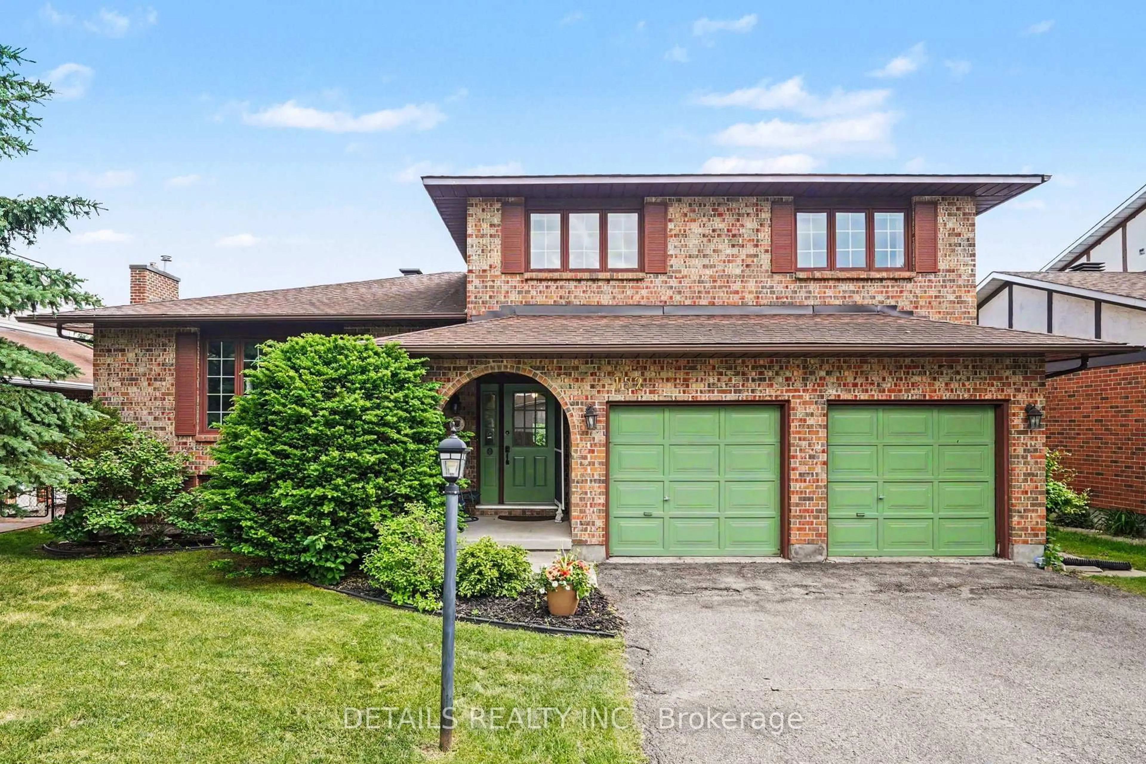 Home with brick exterior material, street for 152 Foxfield Dr, Barrhaven Ontario K2J 2T1