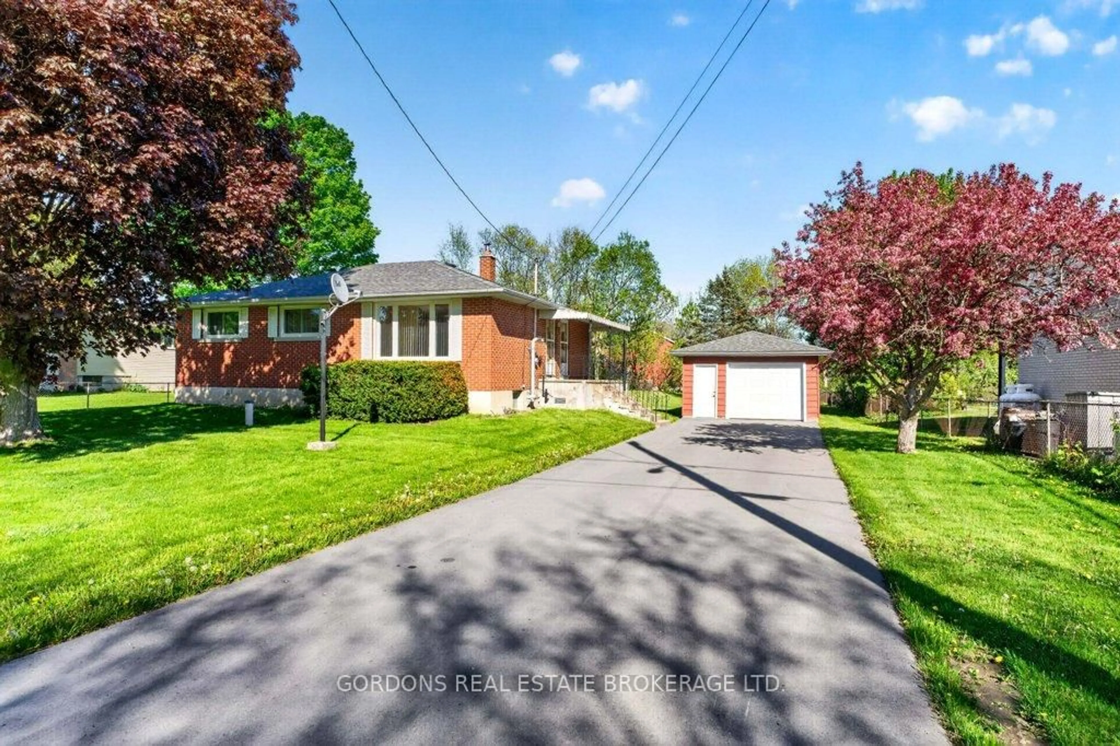 A pic from outside/outdoor area/front of a property/back of a property/a pic from drone, street for 3770 Fair Grounds Rd, Inverary Ontario K0H 1X0