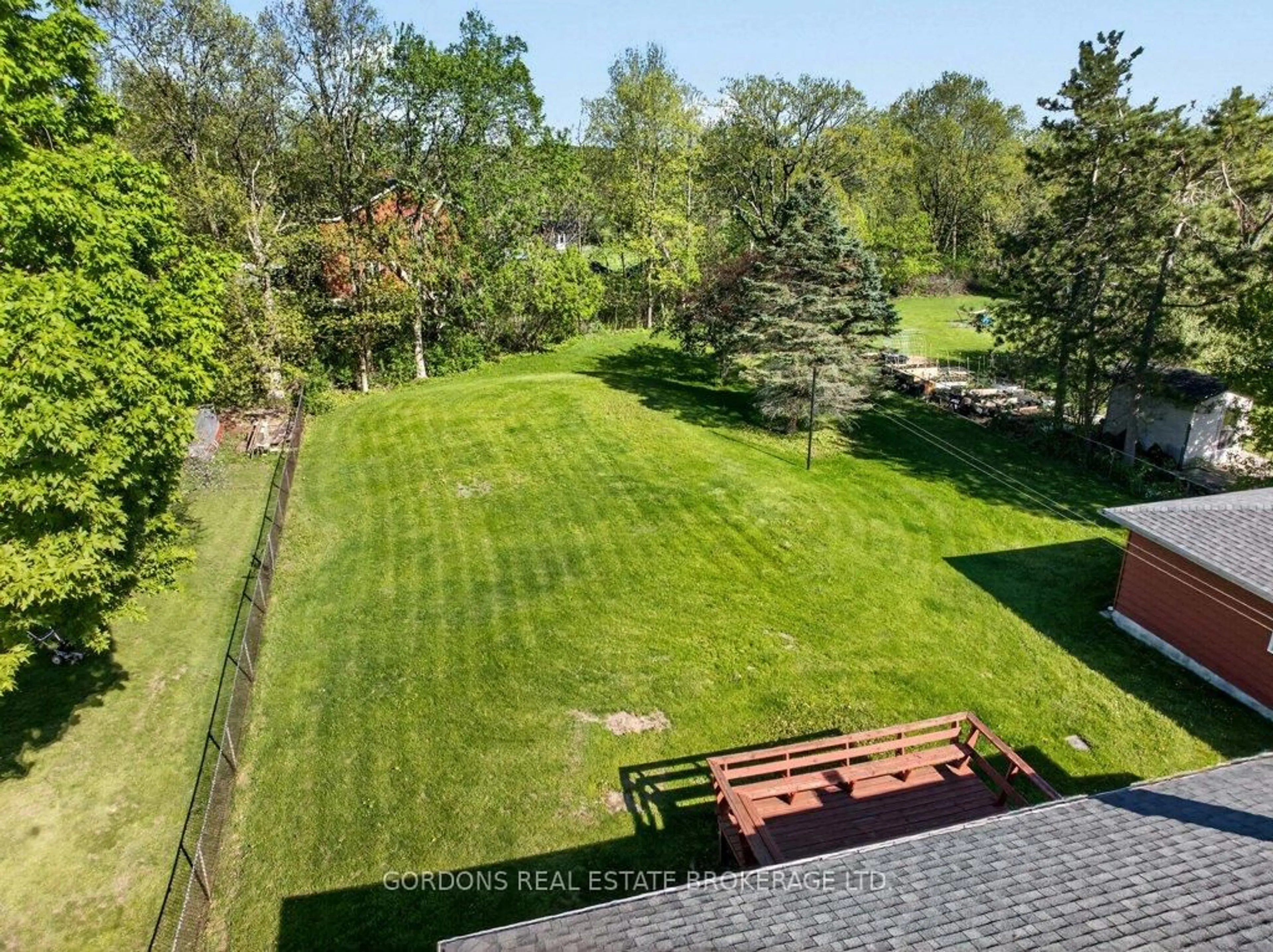 A pic from outside/outdoor area/front of a property/back of a property/a pic from drone, forest/trees view for 3770 Fair Grounds Rd, Inverary Ontario K0H 1X0