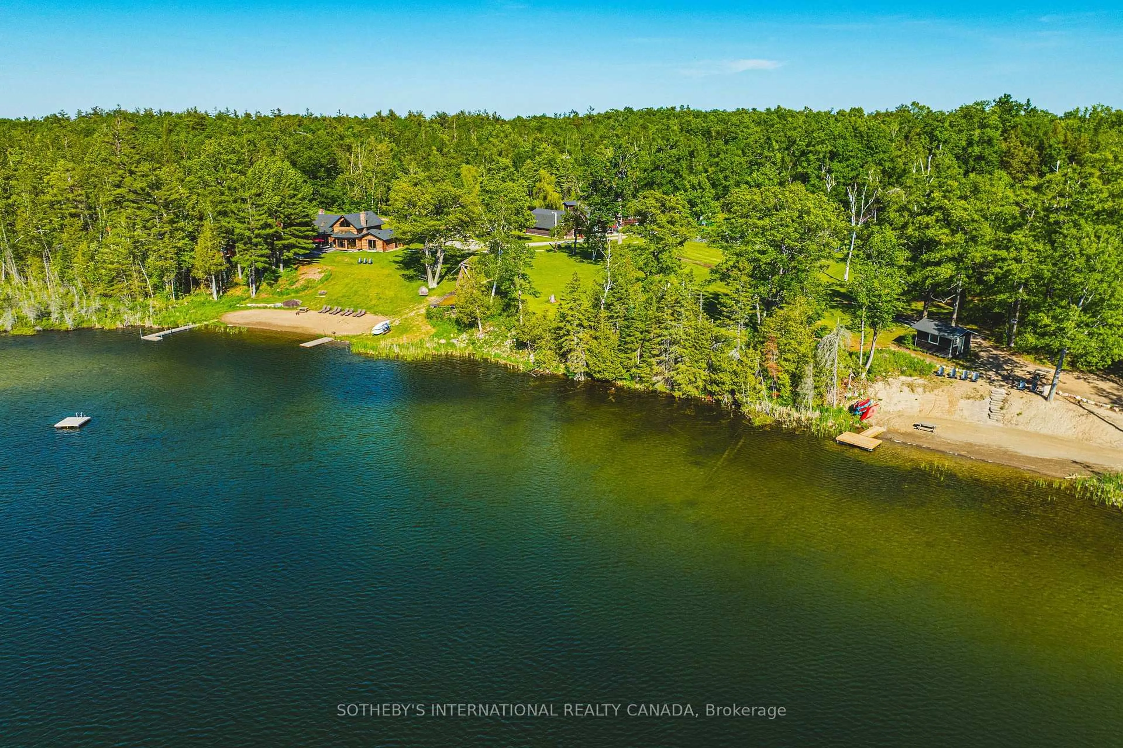A pic from outside/outdoor area/front of a property/back of a property/a pic from drone, water/lake/river/ocean view for 215 Laplantes Rd, Trent Lakes Ontario K0L 1J0
