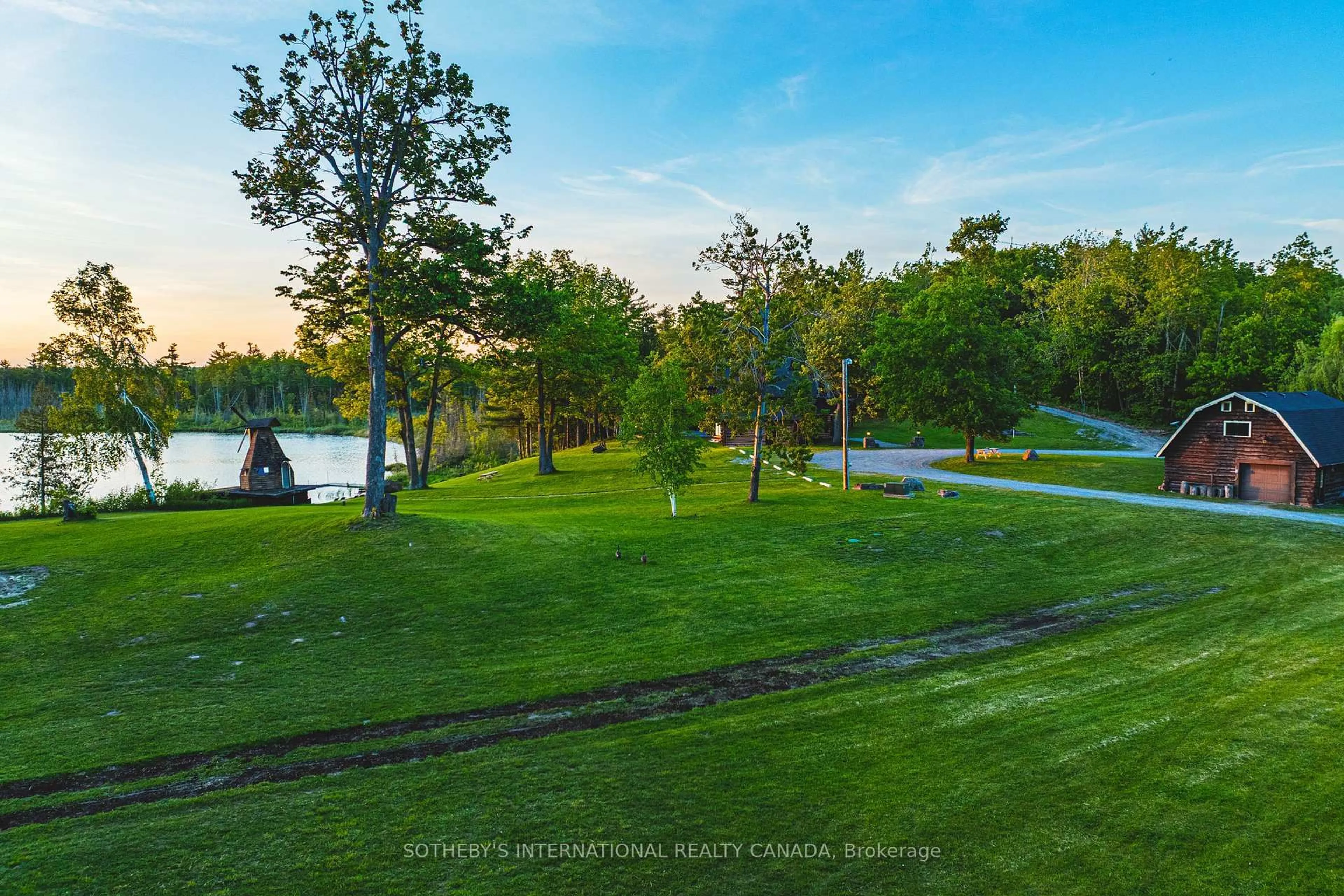 A pic from outside/outdoor area/front of a property/back of a property/a pic from drone, water/lake/river/ocean view for 215 Laplantes Rd, Trent Lakes Ontario K0L 1J0