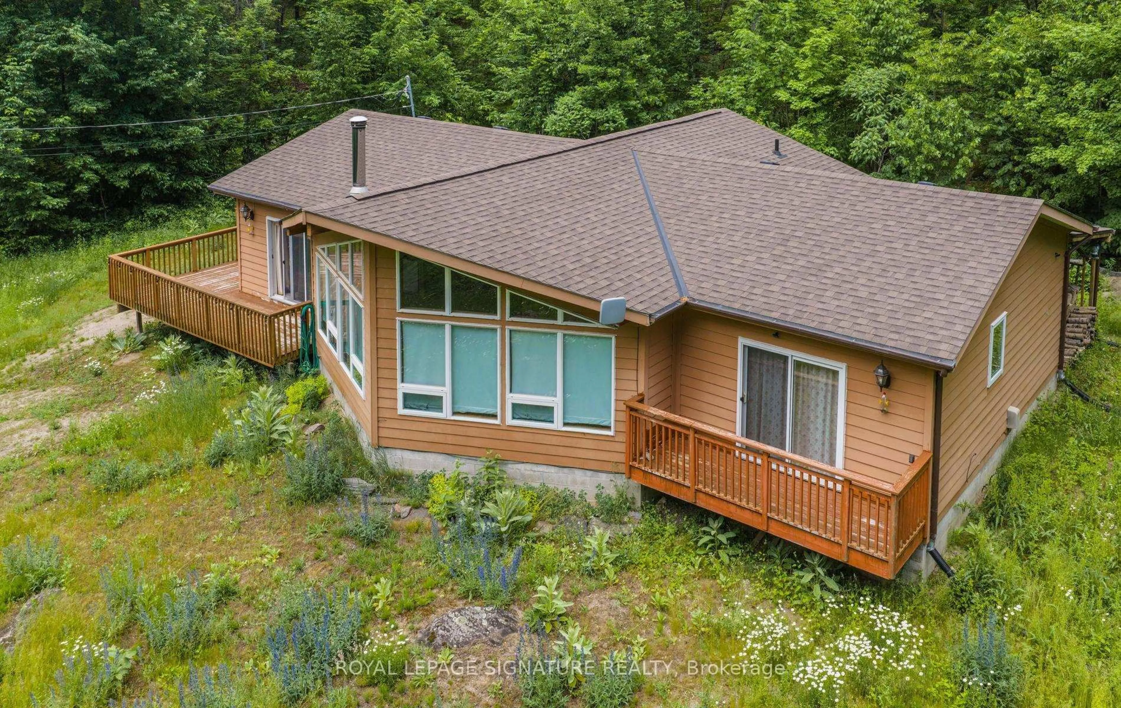 A pic from outside/outdoor area/front of a property/back of a property/a pic from drone, unknown for 369 Nichols Cove Rd, Trent Lakes Ontario K0M 1A0