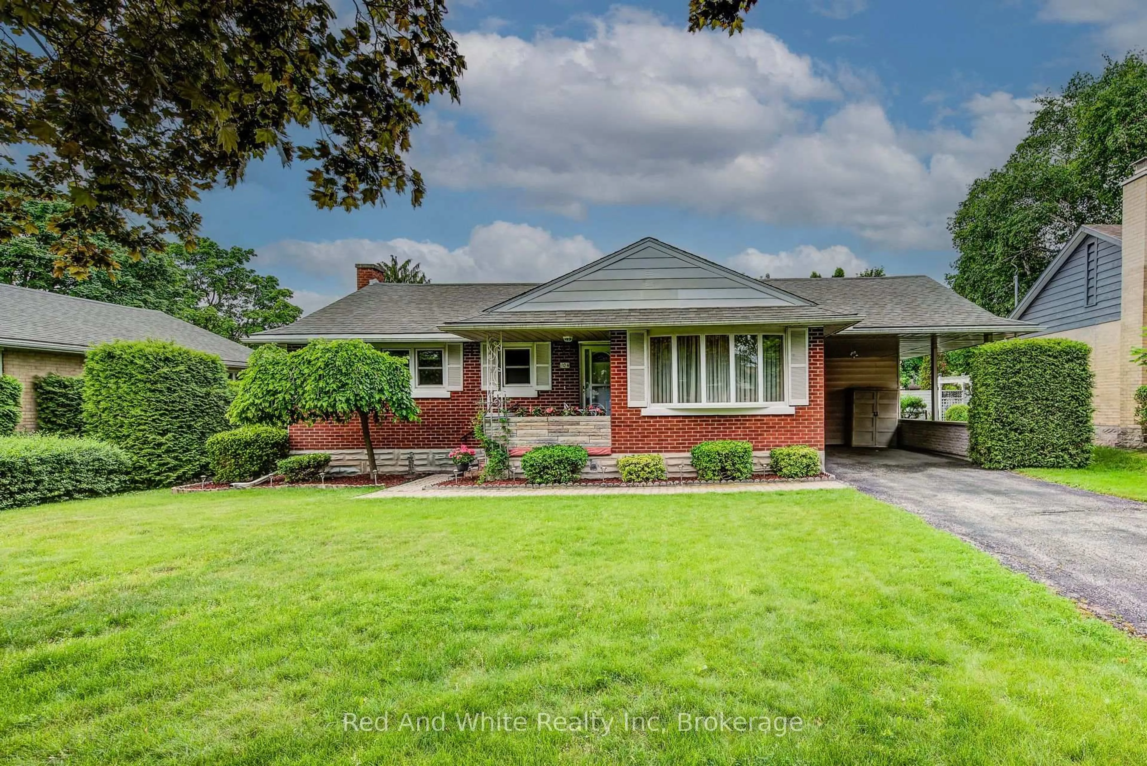 Home with brick exterior material, street for 104 Elgin Cres, Waterloo Ontario N2J 2S2