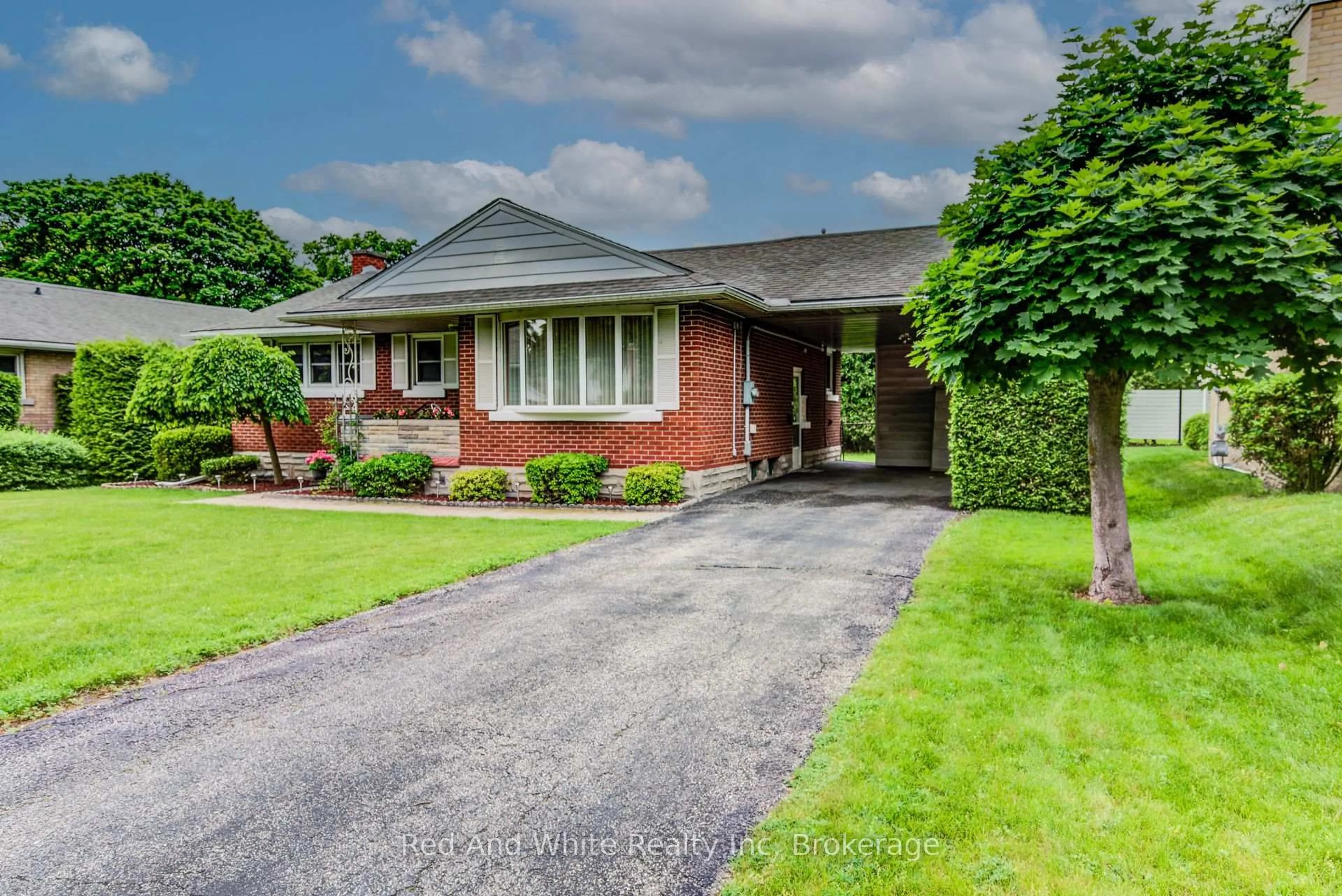 Home with brick exterior material, street for 104 Elgin Cres, Waterloo Ontario N2J 2S2