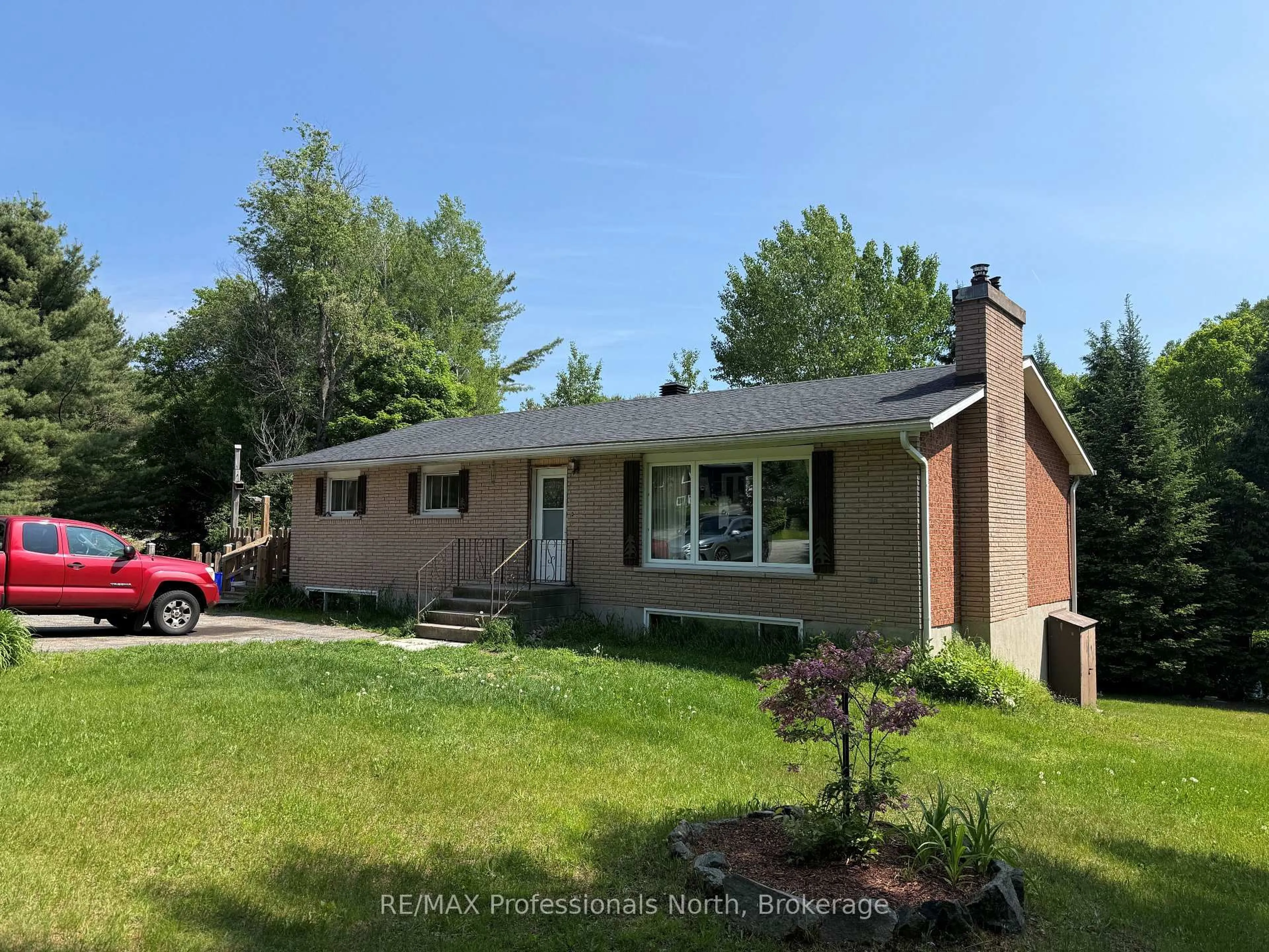 Home with brick exterior material, street for 37 Spruce Dr, Huntsville Ontario P0B 1L0
