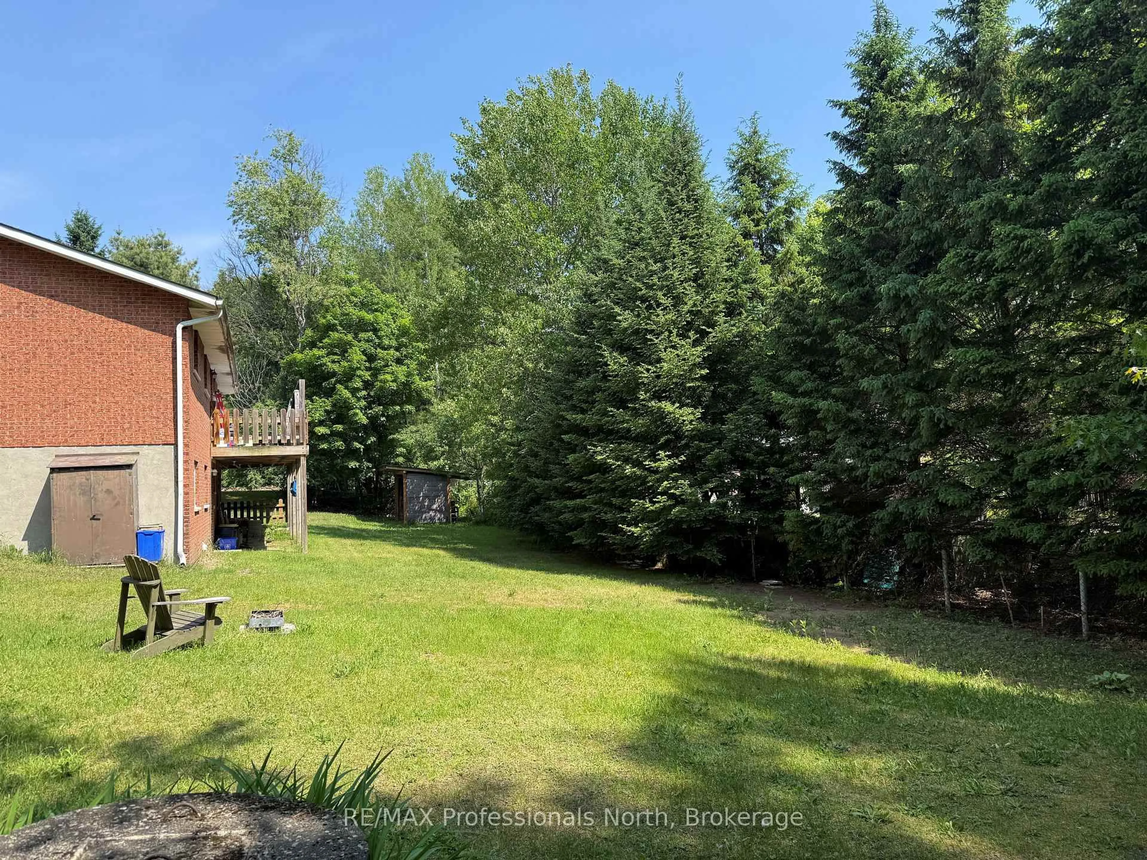 A pic from outside/outdoor area/front of a property/back of a property/a pic from drone, forest/trees view for 37 Spruce Dr, Huntsville Ontario P0B 1L0