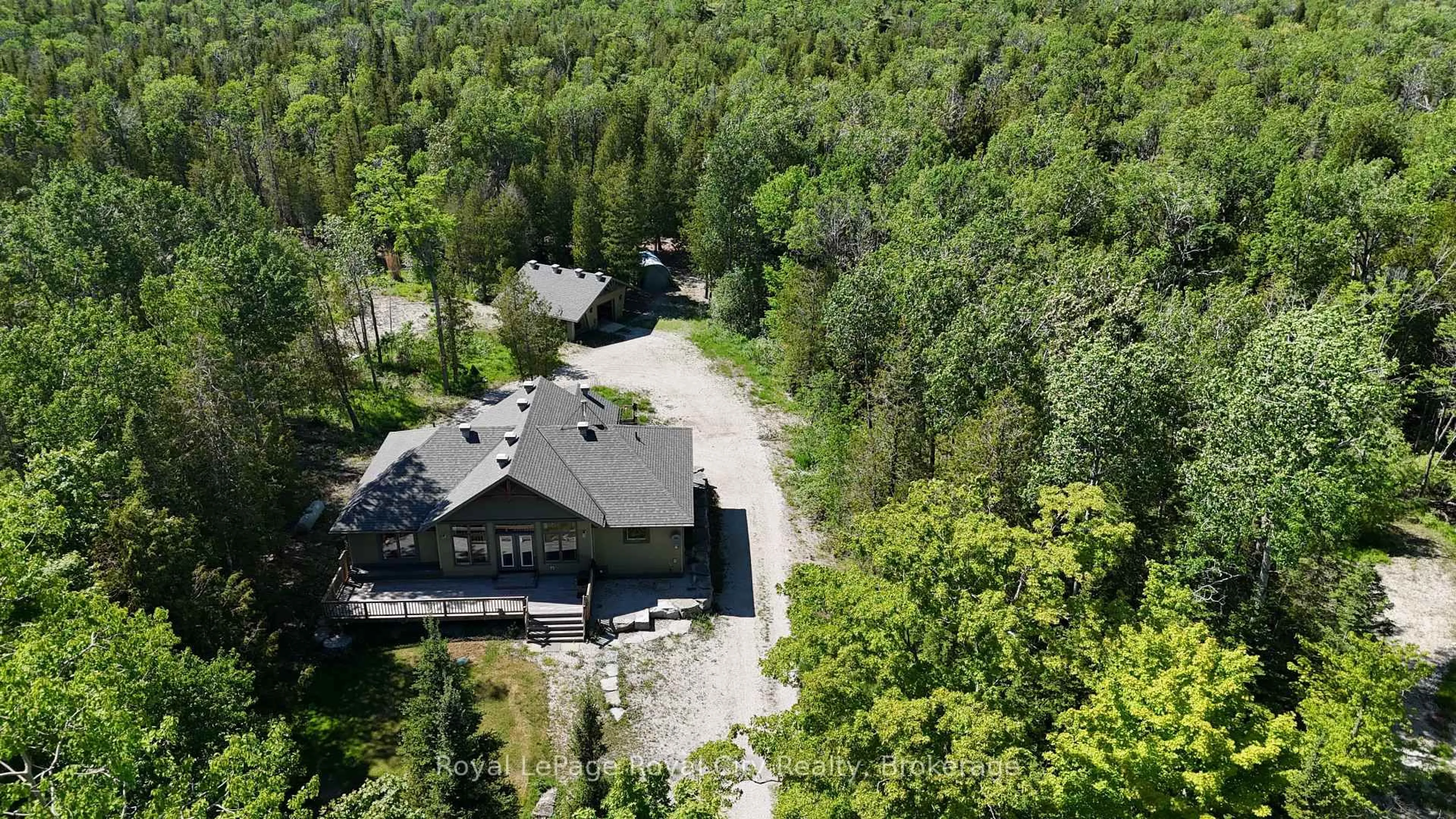 A pic from outside/outdoor area/front of a property/back of a property/a pic from drone, forest/trees view for 170 Cape Hurd Rd, Northern Bruce Peninsula Ontario N0H 2R0