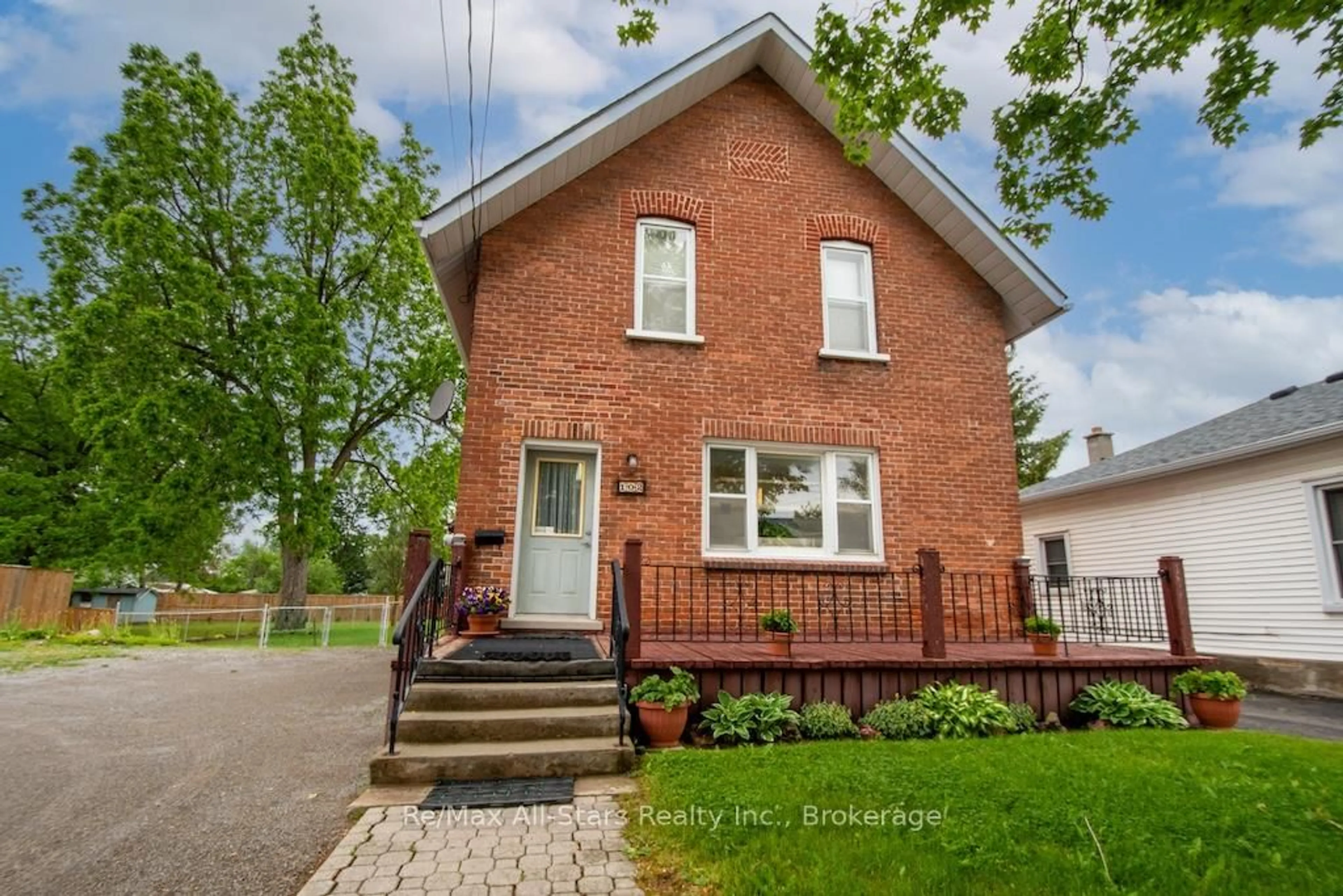 Home with brick exterior material, street for 102 Queen St, Kawartha Lakes Ontario K9V 1G6