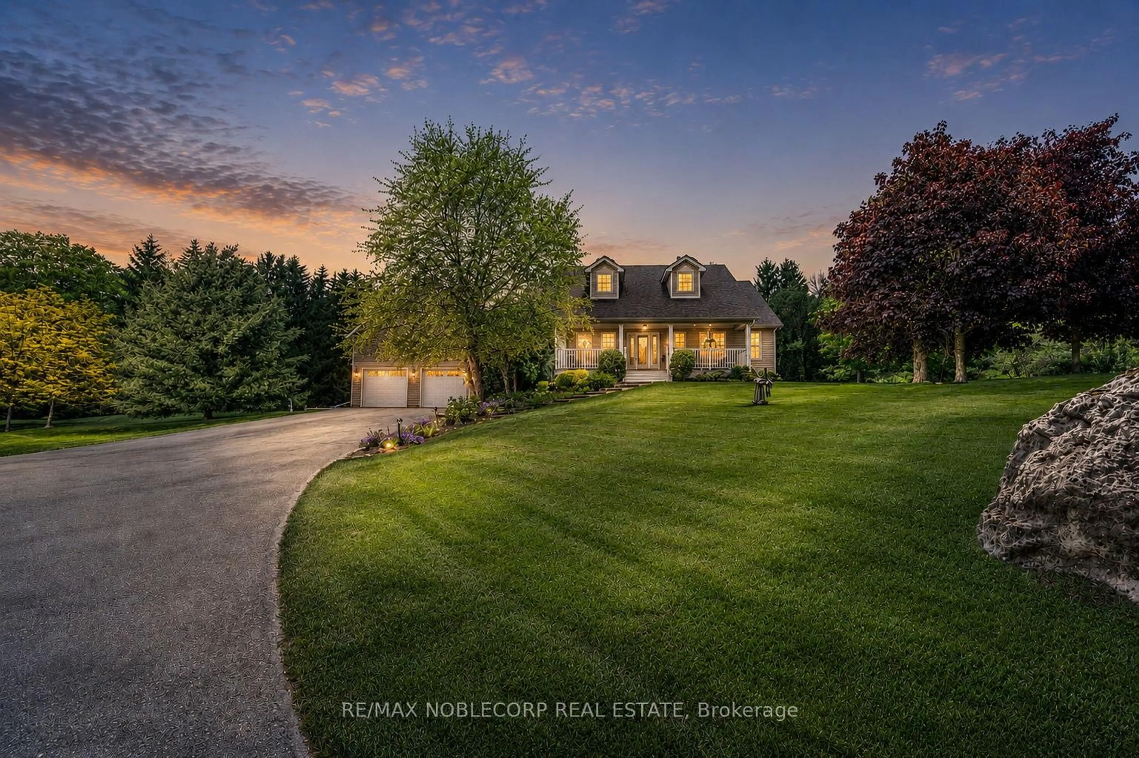 A pic from outside/outdoor area/front of a property/back of a property/a pic from drone, mountain view for 793073 3rd Line, Mono Ontario L9W 5X6