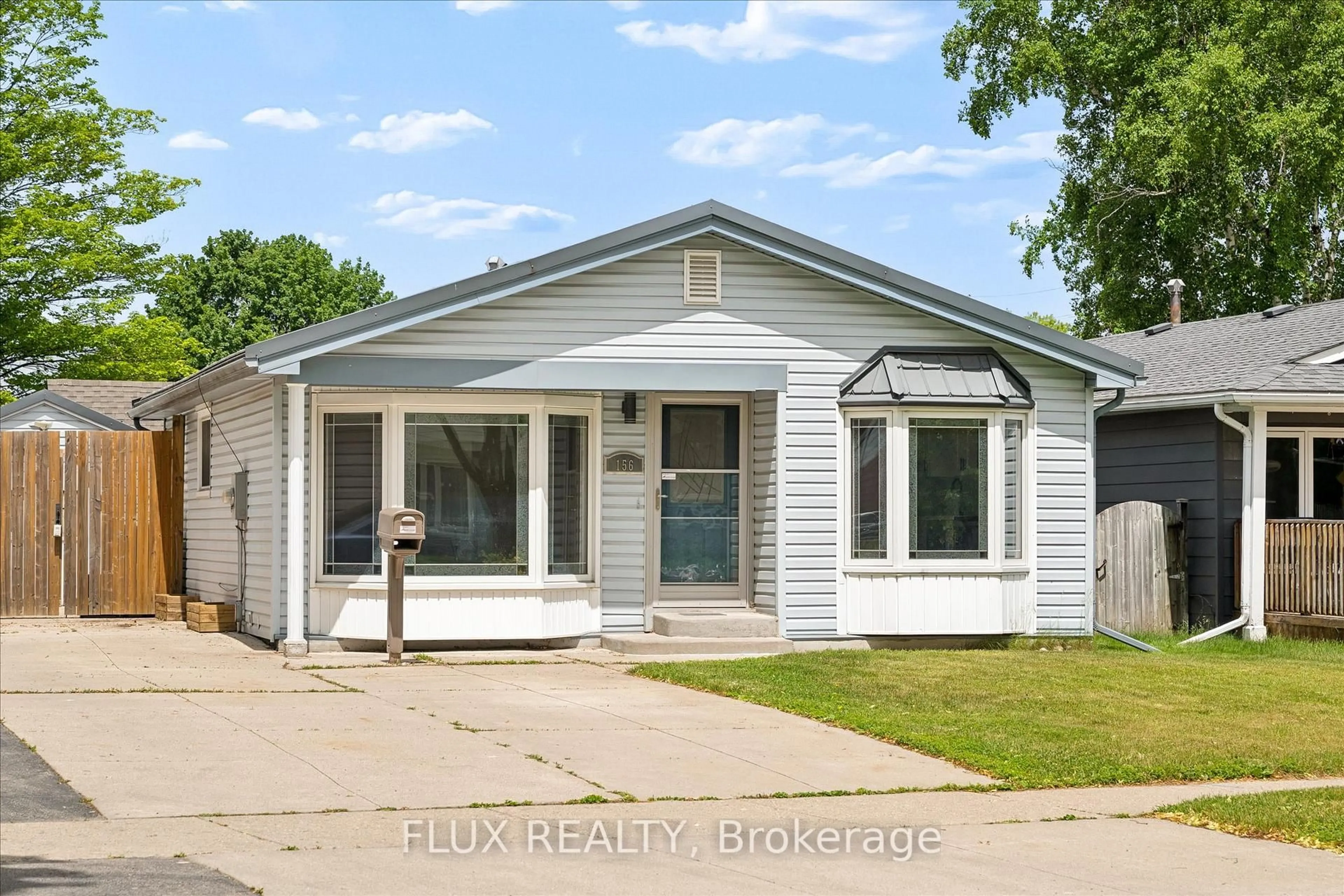 Home with vinyl exterior material, street for 156 Traynor Ave, Kitchener Ontario N2C 1W5