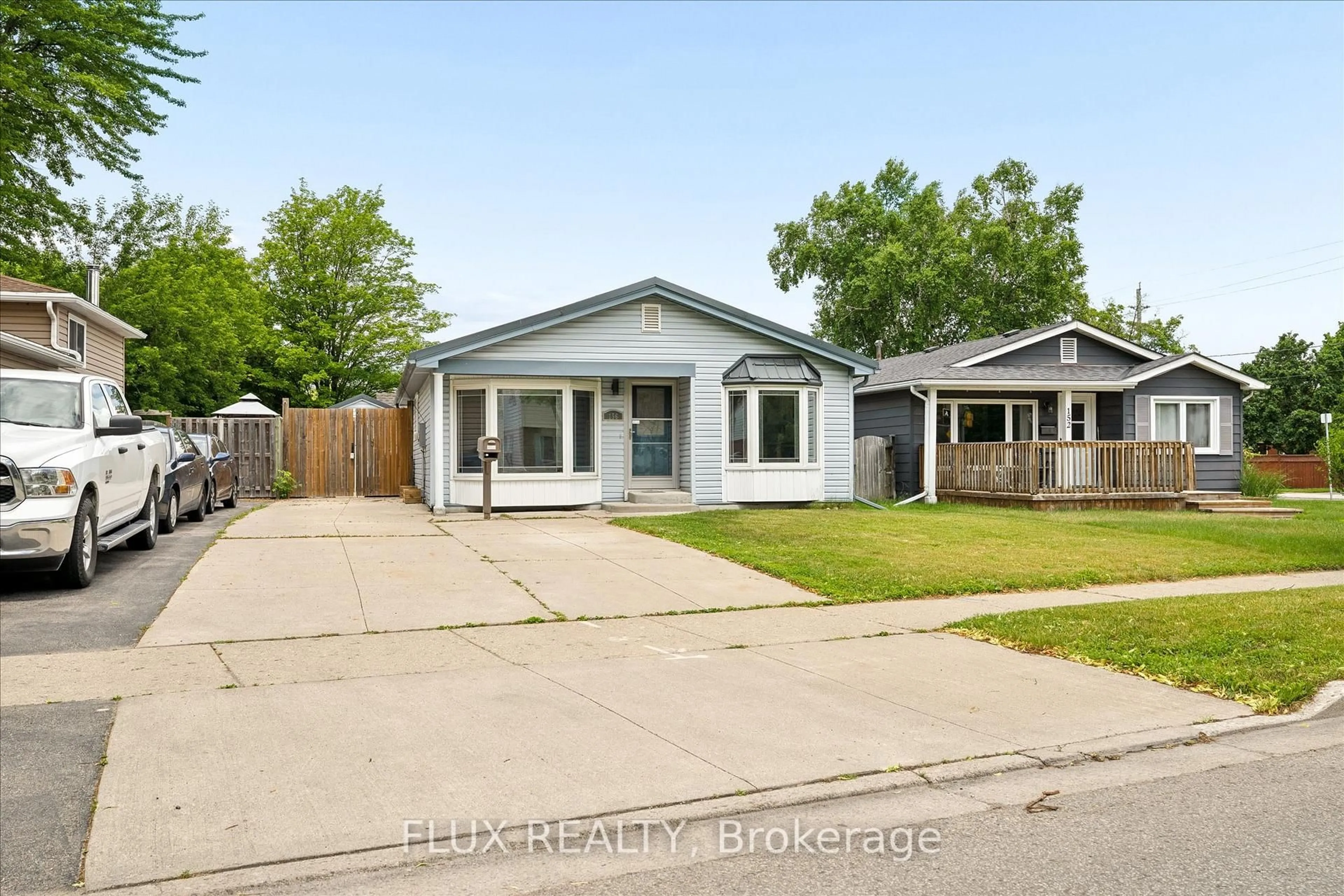 Home with vinyl exterior material, street for 156 Traynor Ave, Kitchener Ontario N2C 1W5