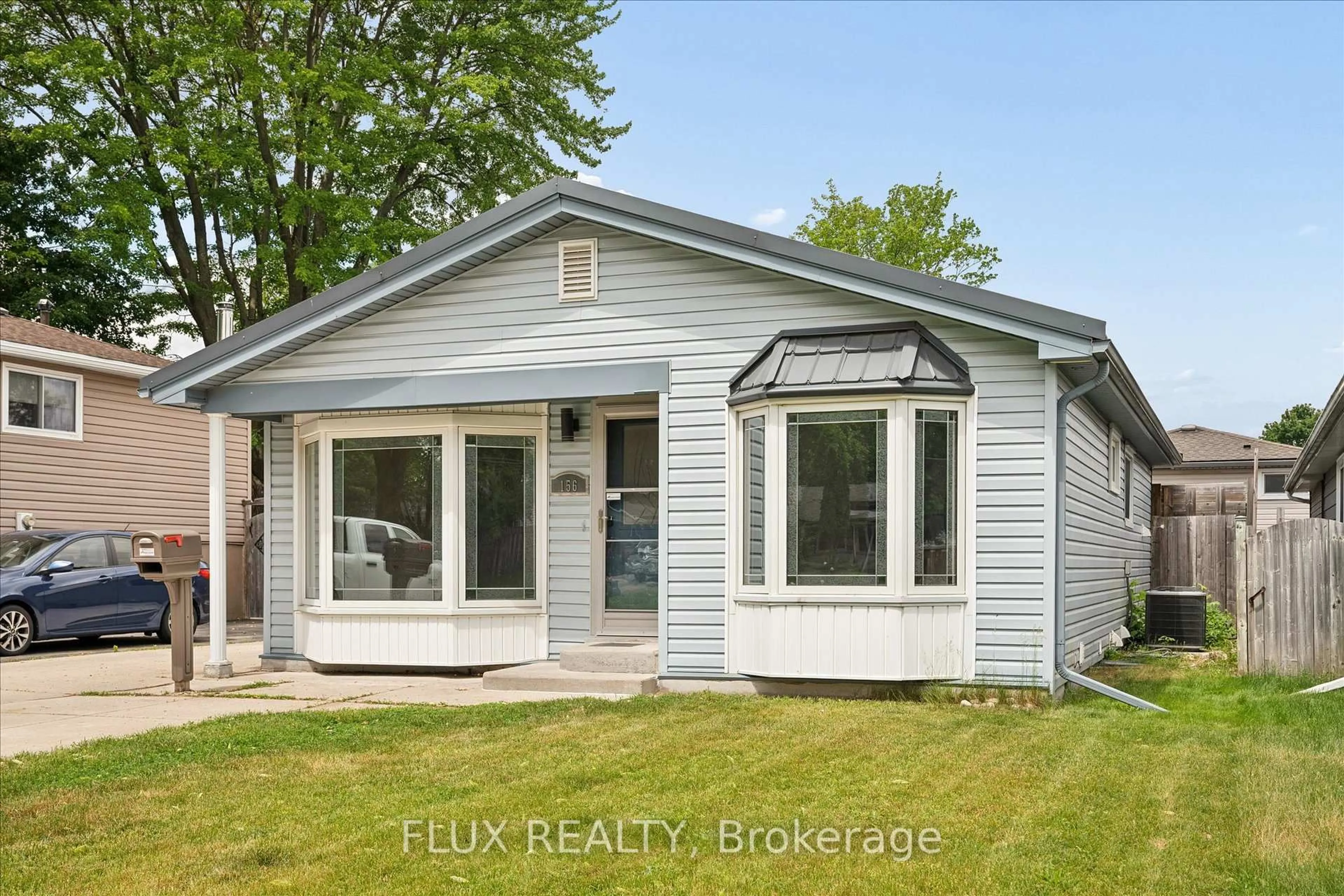 Home with vinyl exterior material, street for 156 Traynor Ave, Kitchener Ontario N2C 1W5