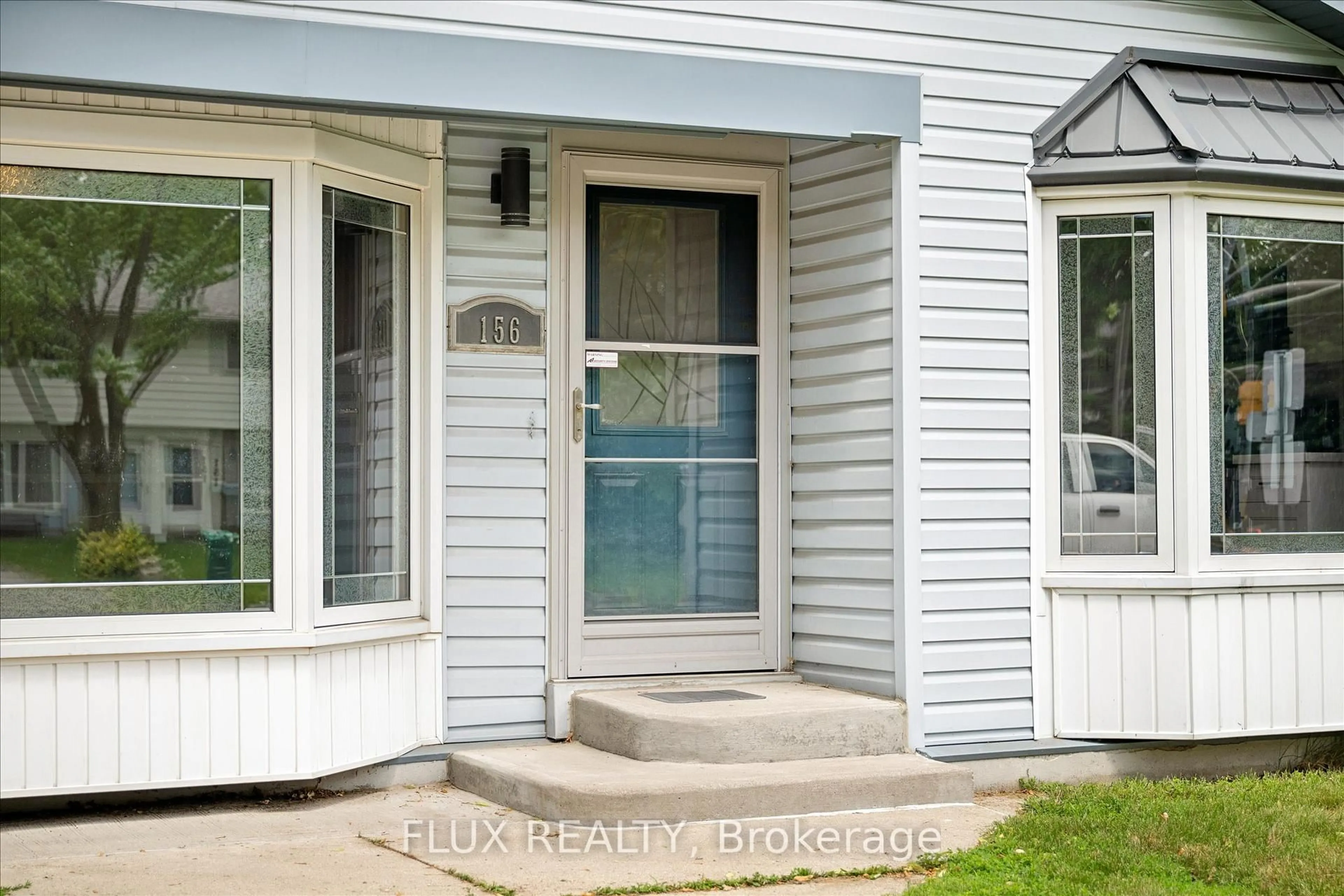 Home with vinyl exterior material, street for 156 Traynor Ave, Kitchener Ontario N2C 1W5