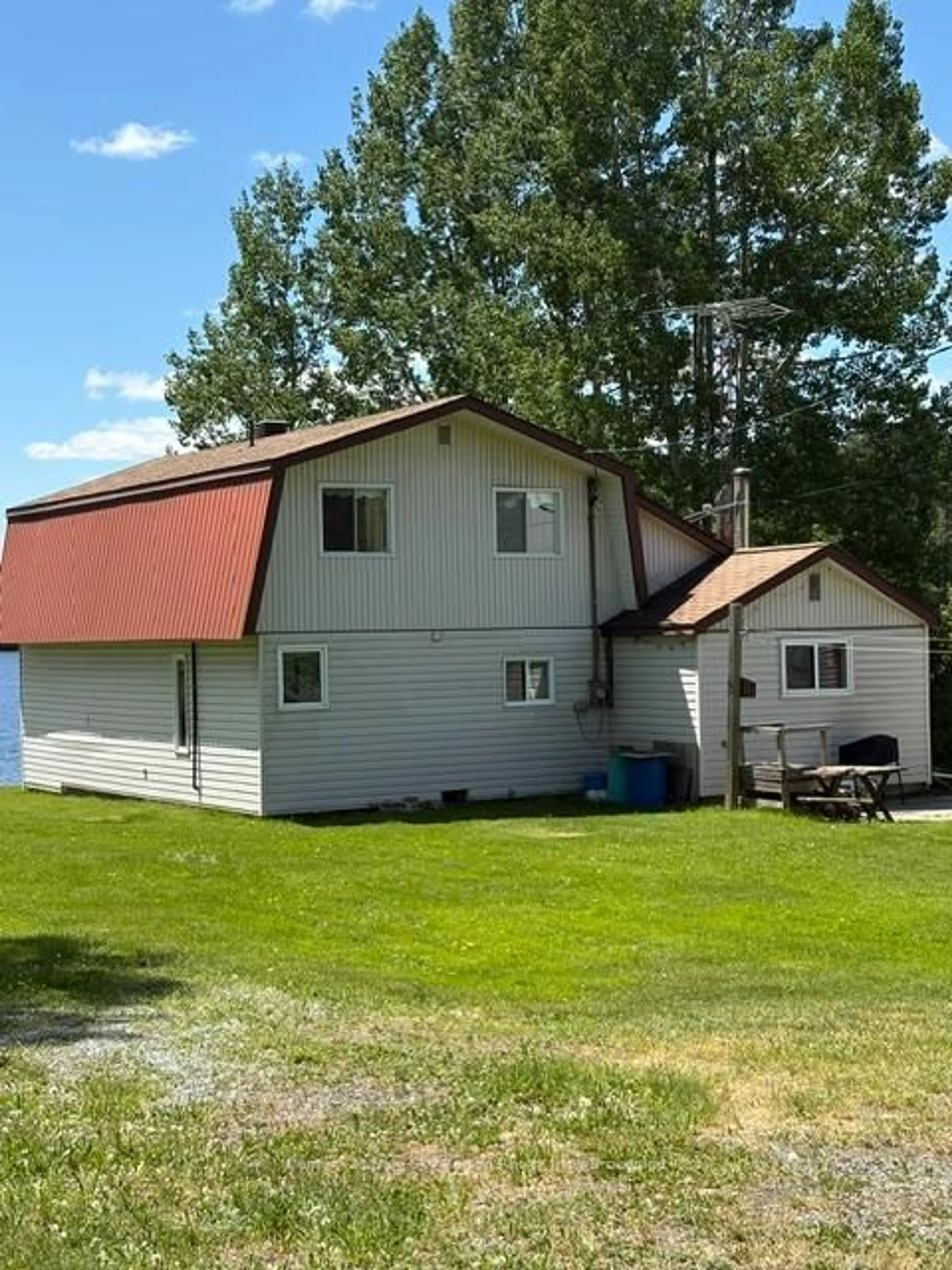 A pic from outside/outdoor area/front of a property/back of a property/a pic from drone, unknown for 7408 Highway 11, Temagami Ontario P0H 2H0