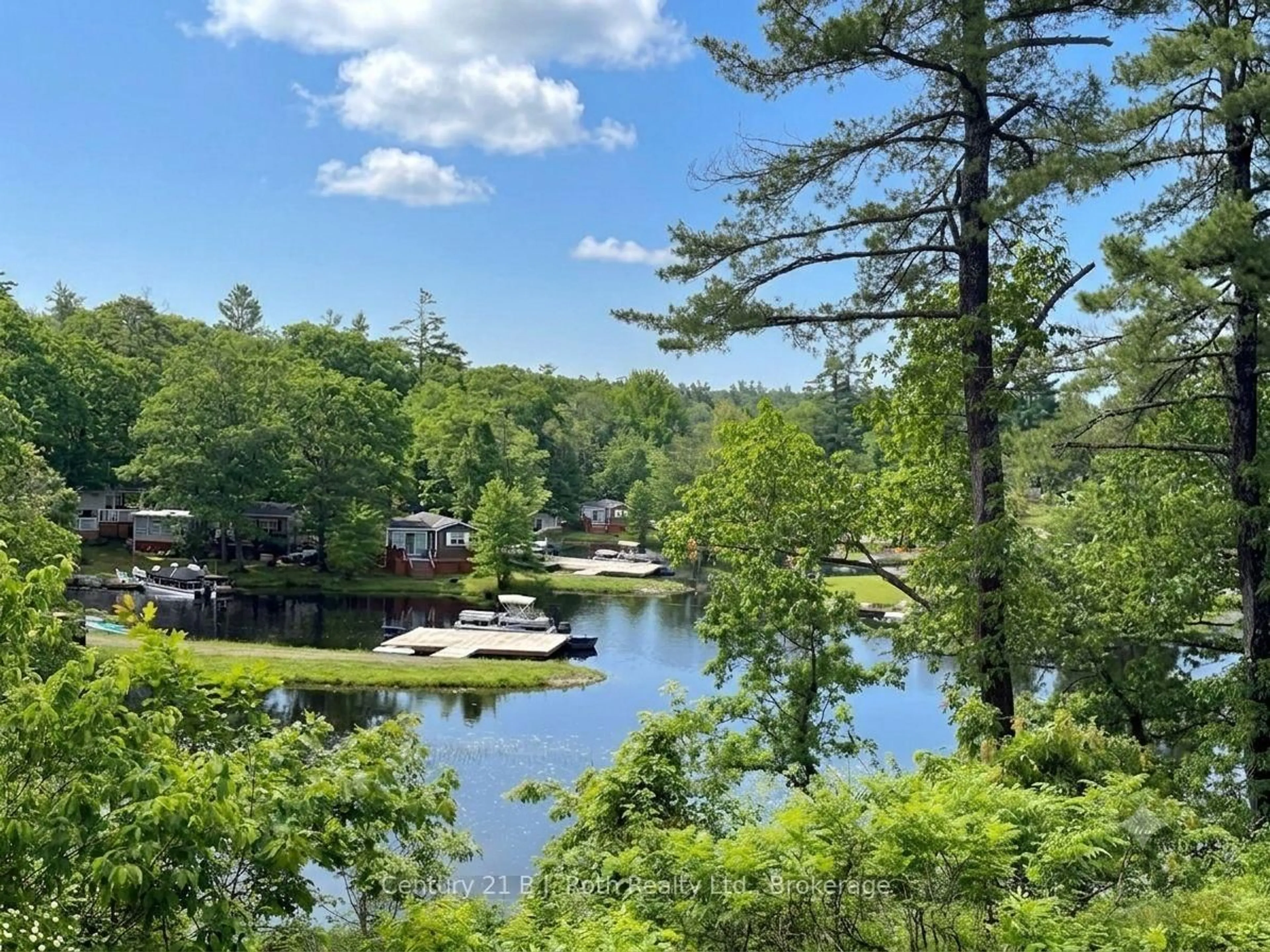 A pic from outside/outdoor area/front of a property/back of a property/a pic from drone, water/lake/river/ocean view for 1336 SOUTH MORRISON LAKE Rd #27 Maple Ridge, Gravenhurst Ontario P0E 1G0