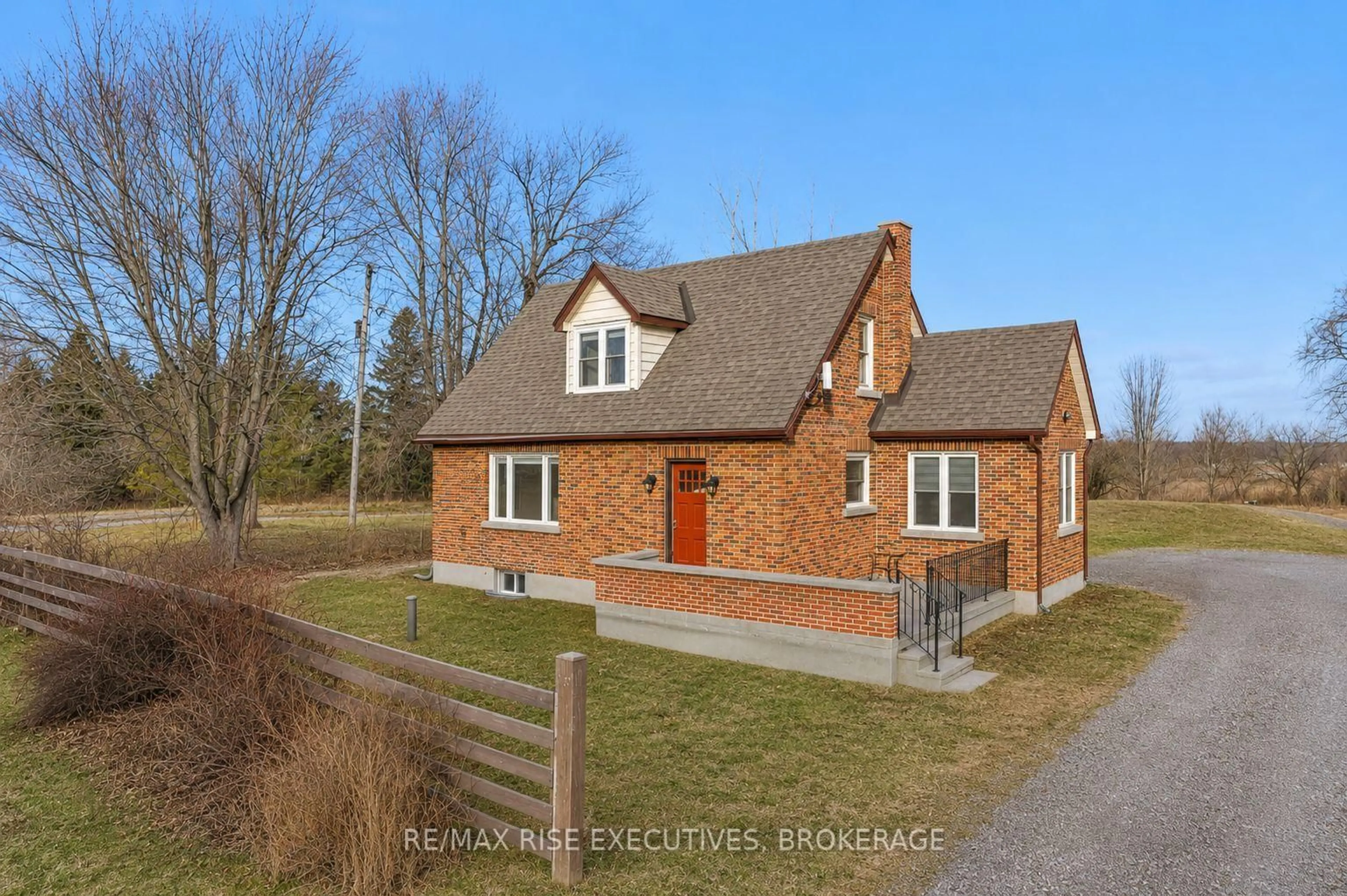 Home with brick exterior material, street for 3658 Highway 2, Gananoque Ontario K7G 2V5