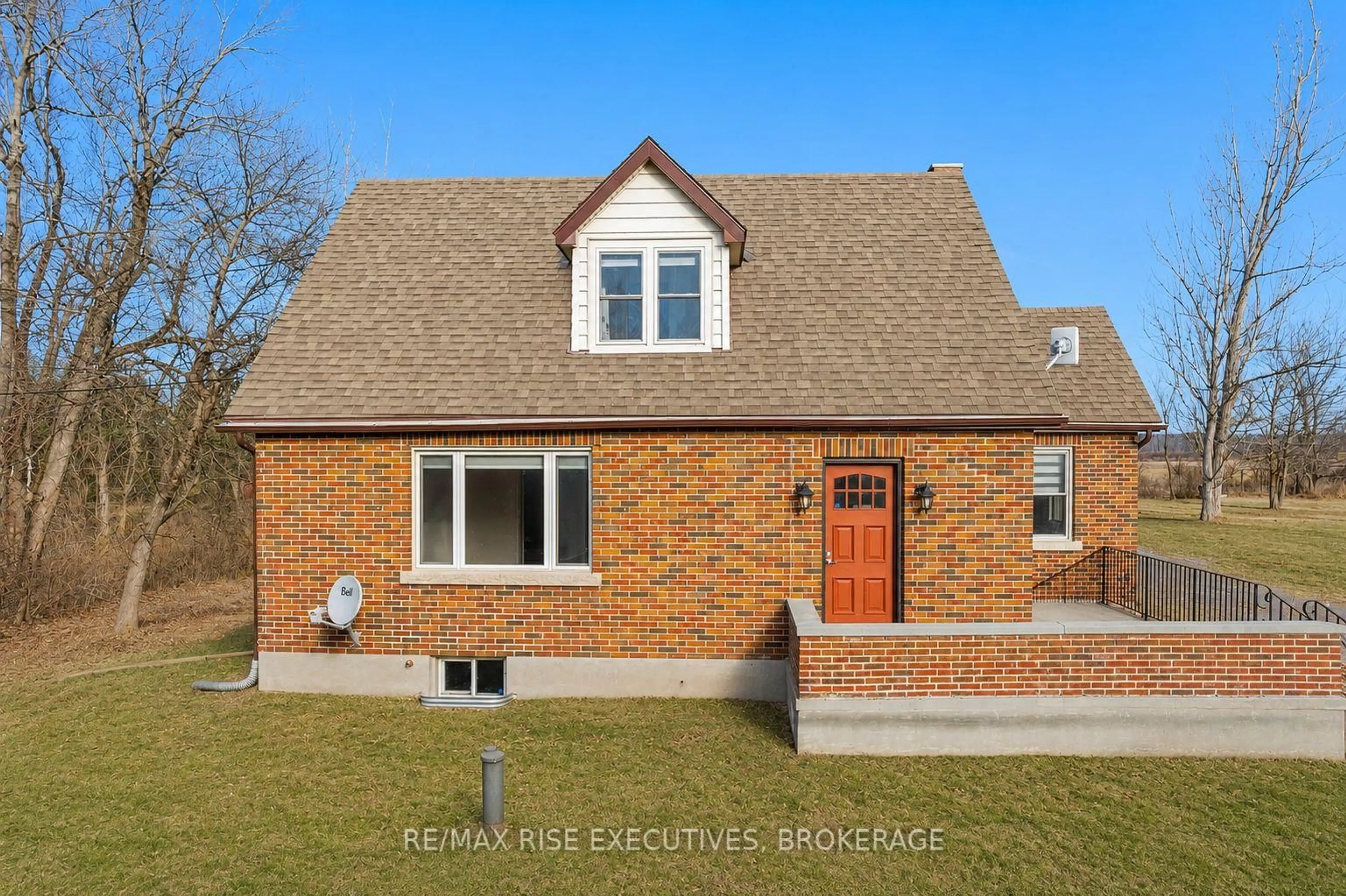 Home with brick exterior material, street for 3658 Highway 2, Gananoque Ontario K7G 2V5