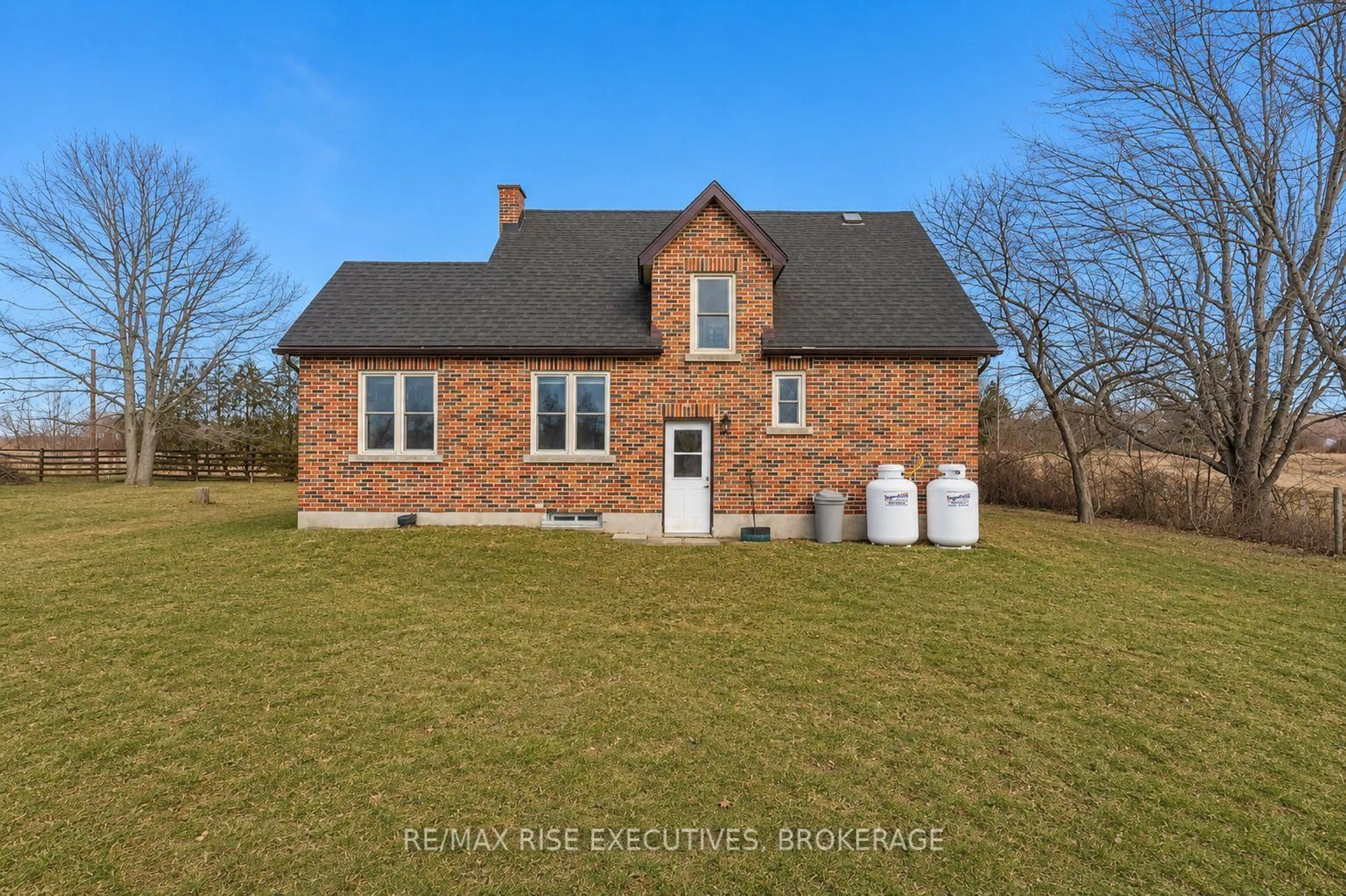 Home with brick exterior material, street for 3658 Highway 2, Gananoque Ontario K7G 2V5
