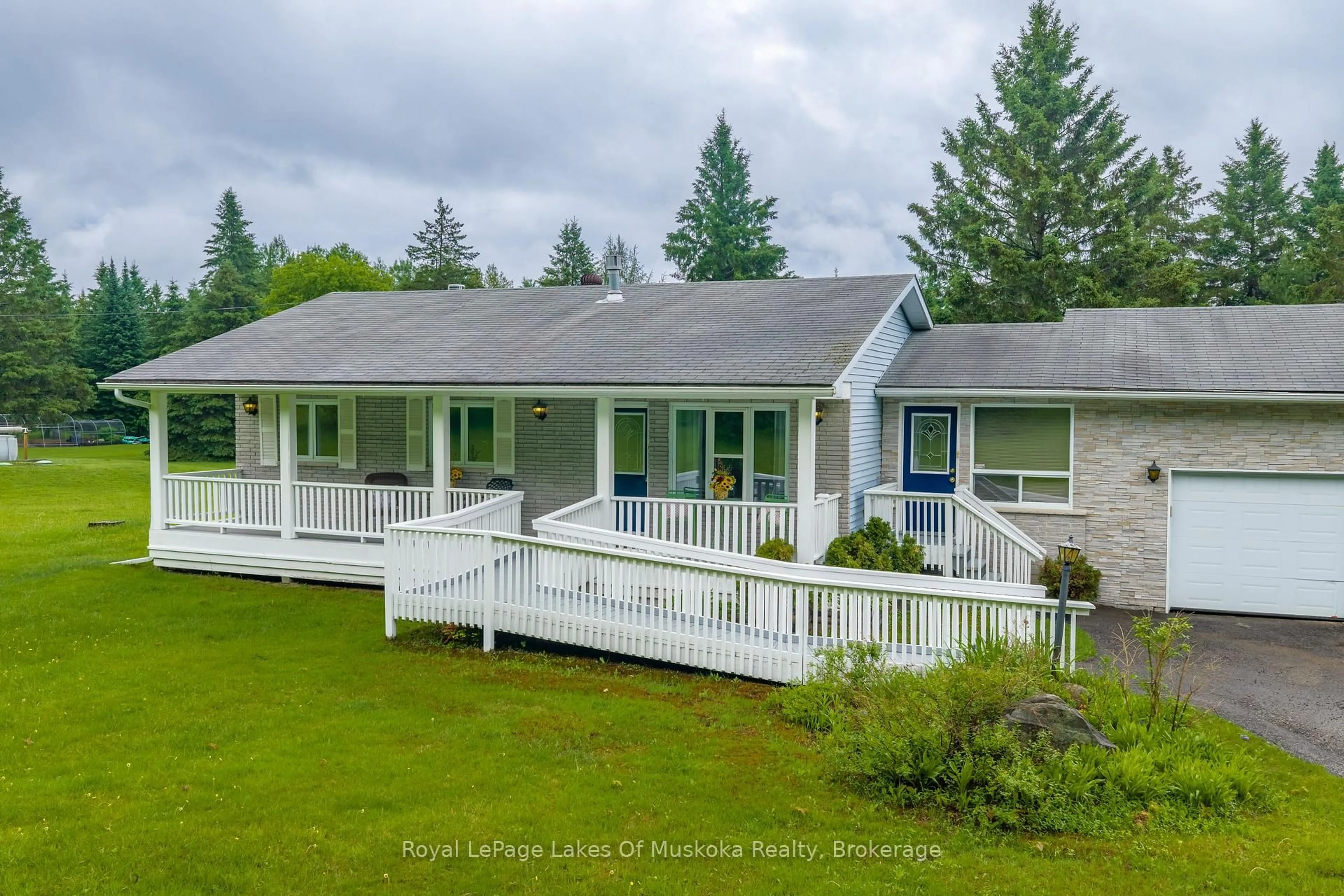A pic from outside/outdoor area/front of a property/back of a property/a pic from drone, unknown for 625 Old North Rd, Huntsville Ontario P1H 2J4