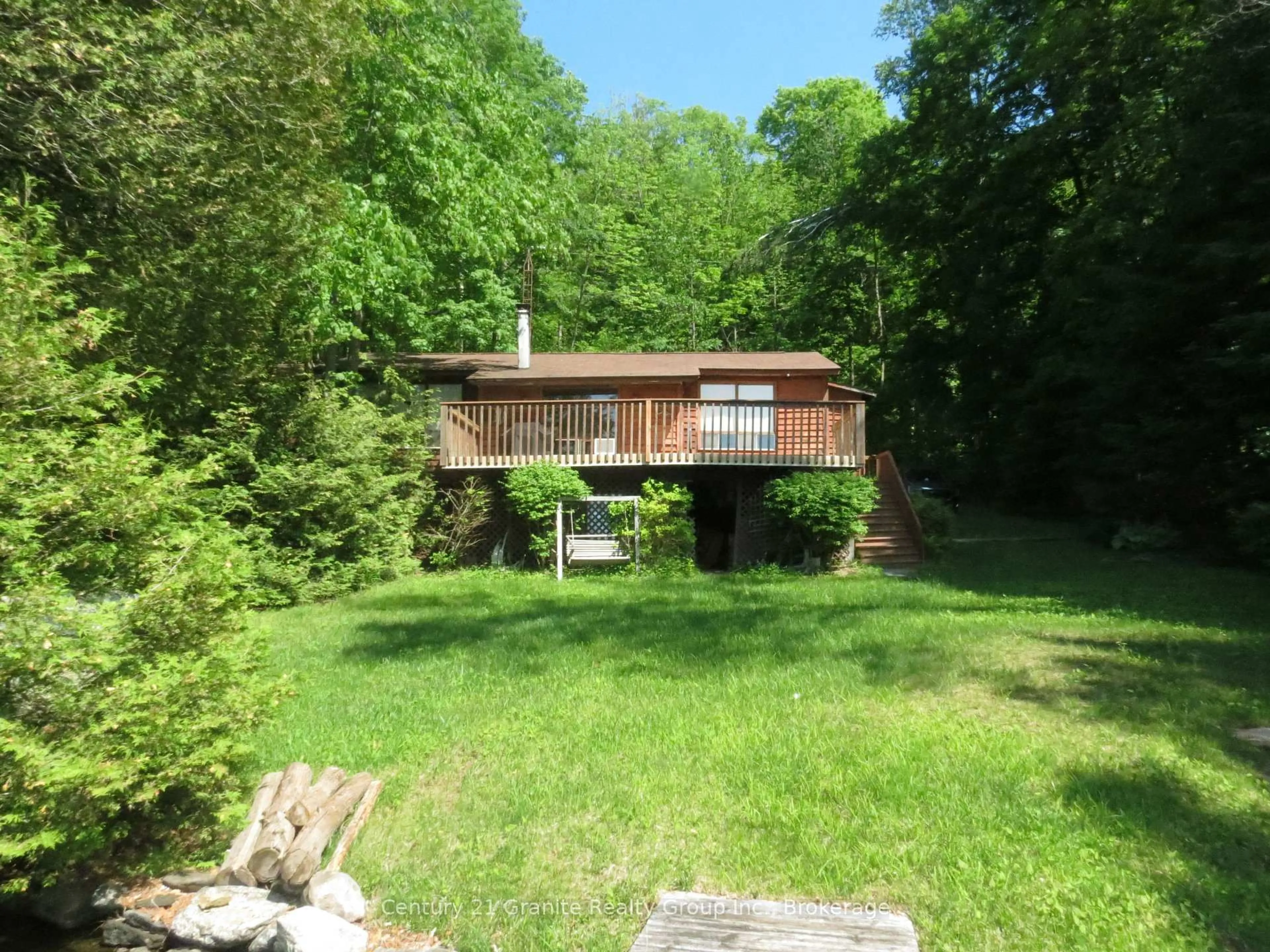 A pic from outside/outdoor area/front of a property/back of a property/a pic from drone, forest/trees view for 245 Fr 330, Trent Lakes Ontario K0M 1R0