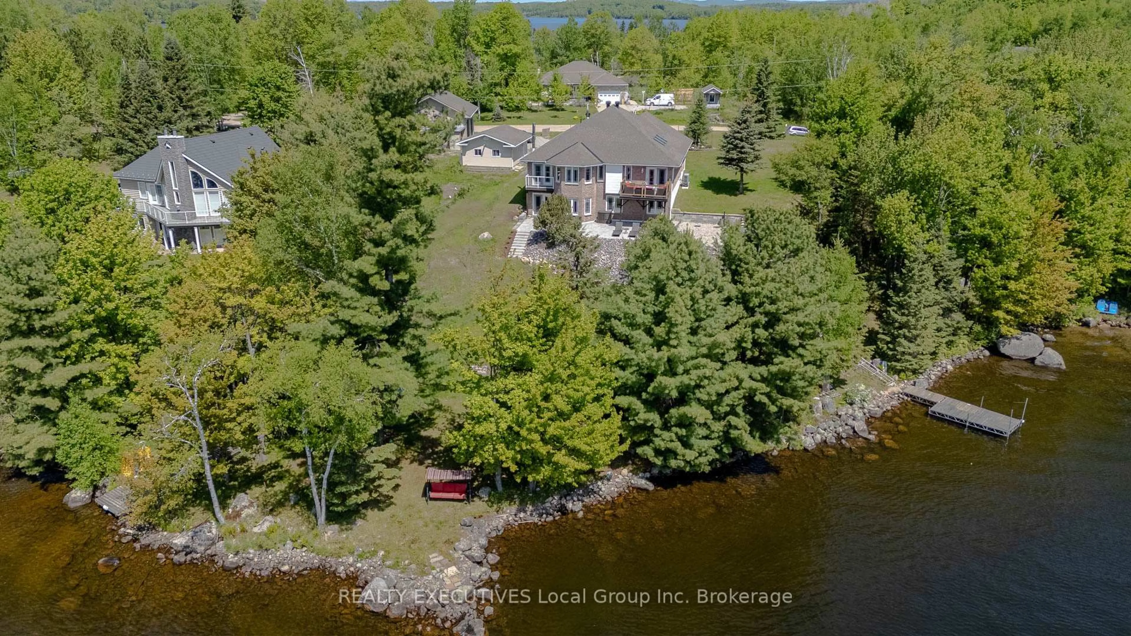 A pic from outside/outdoor area/front of a property/back of a property/a pic from drone, water/lake/river/ocean view for 910 NOSBONSING PARK Rd, East Ferris Ontario P0H 1K0