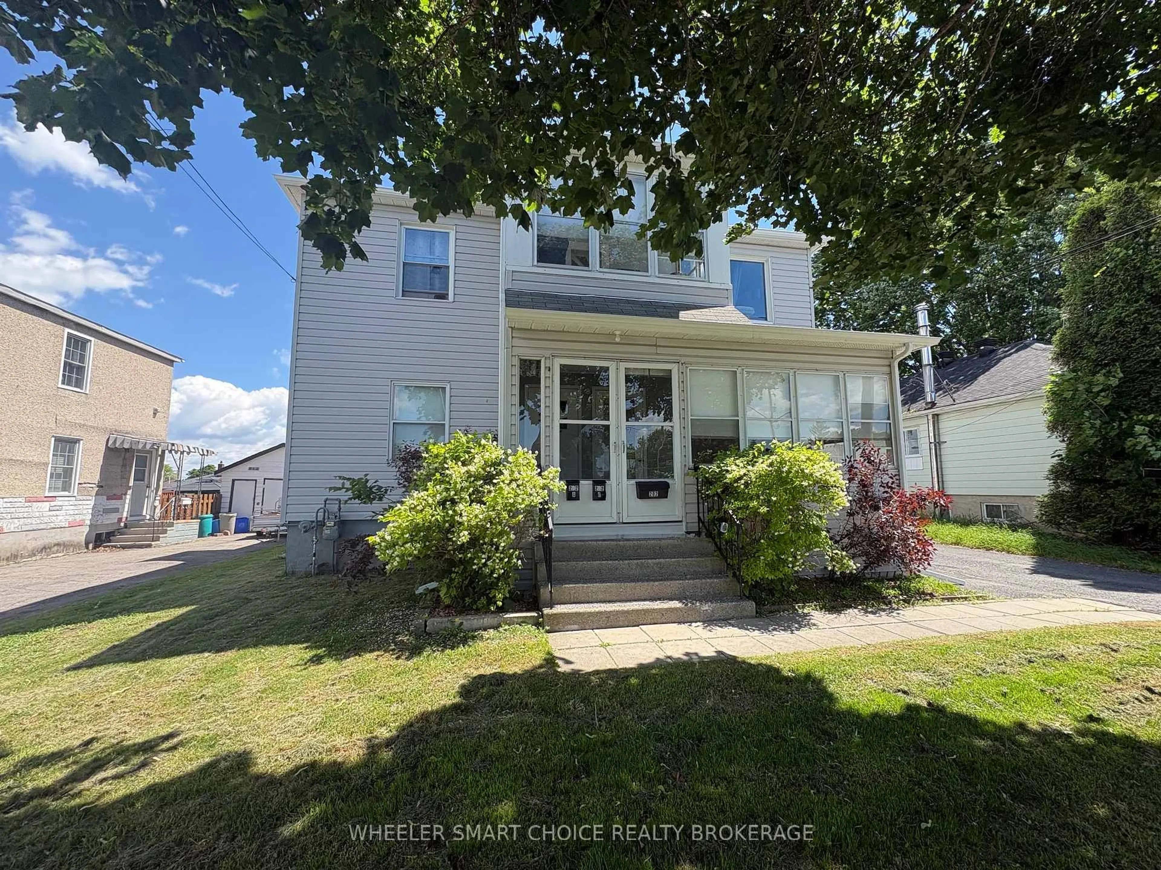 A pic from outside/outdoor area/front of a property/back of a property/a pic from drone, street for 202 Jarvis St, Cornwall Ontario K6H 5J3