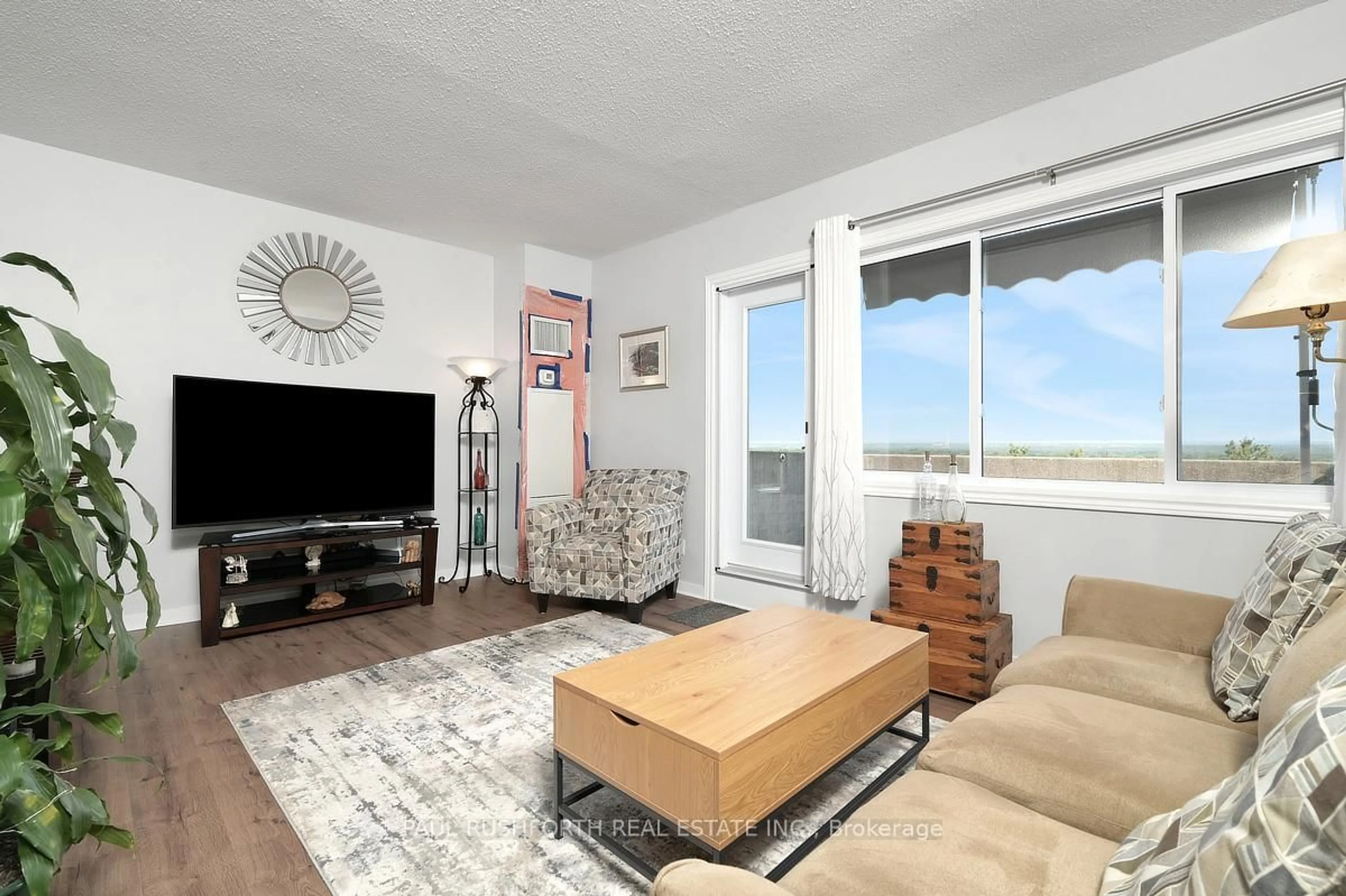 Living room with furniture, unknown for 1599 Lassiter Terr #819, Ottawa Ontario K1J 8R6