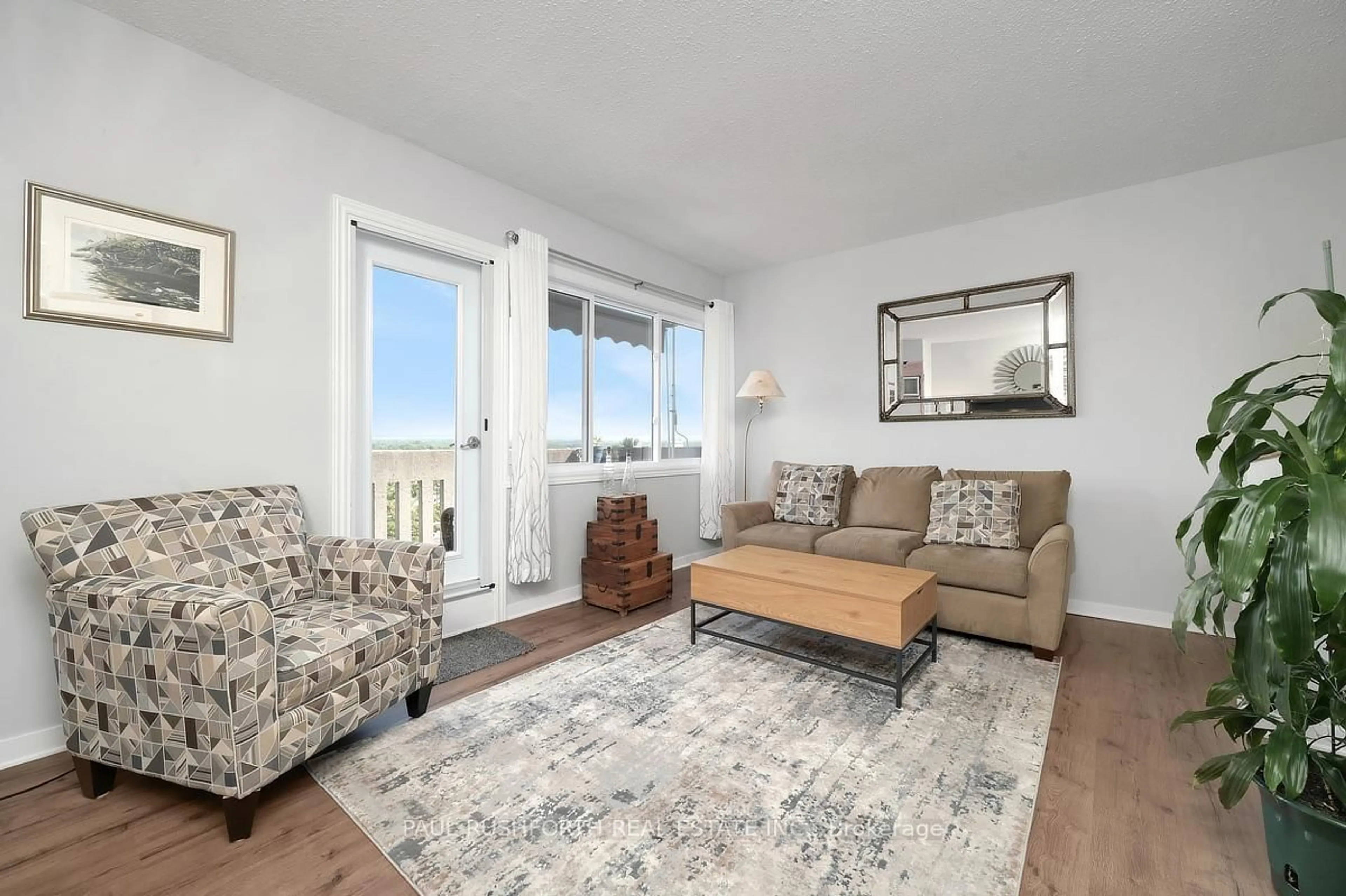 Living room with furniture, unknown for 1599 Lassiter Terr #819, Ottawa Ontario K1J 8R6