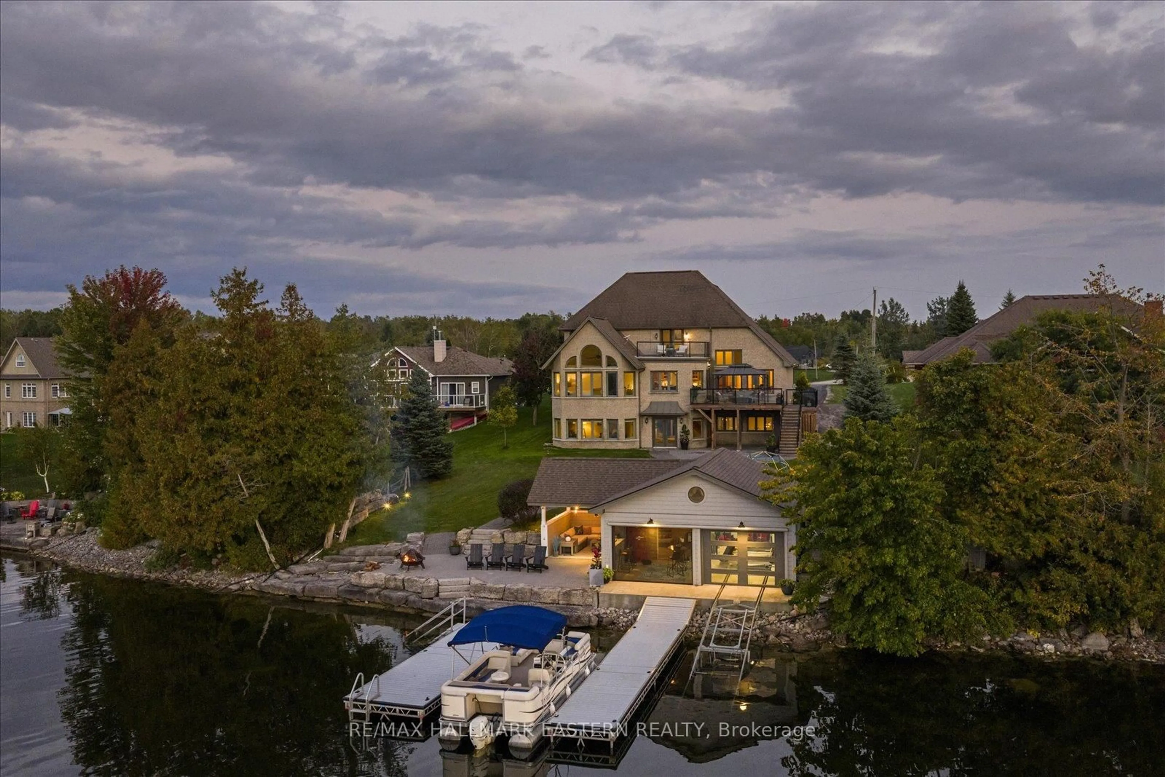 A pic from outside/outdoor area/front of a property/back of a property/a pic from drone, water/lake/river/ocean view for 2112 Truman Dr, Selwyn Ontario K0L 2H0
