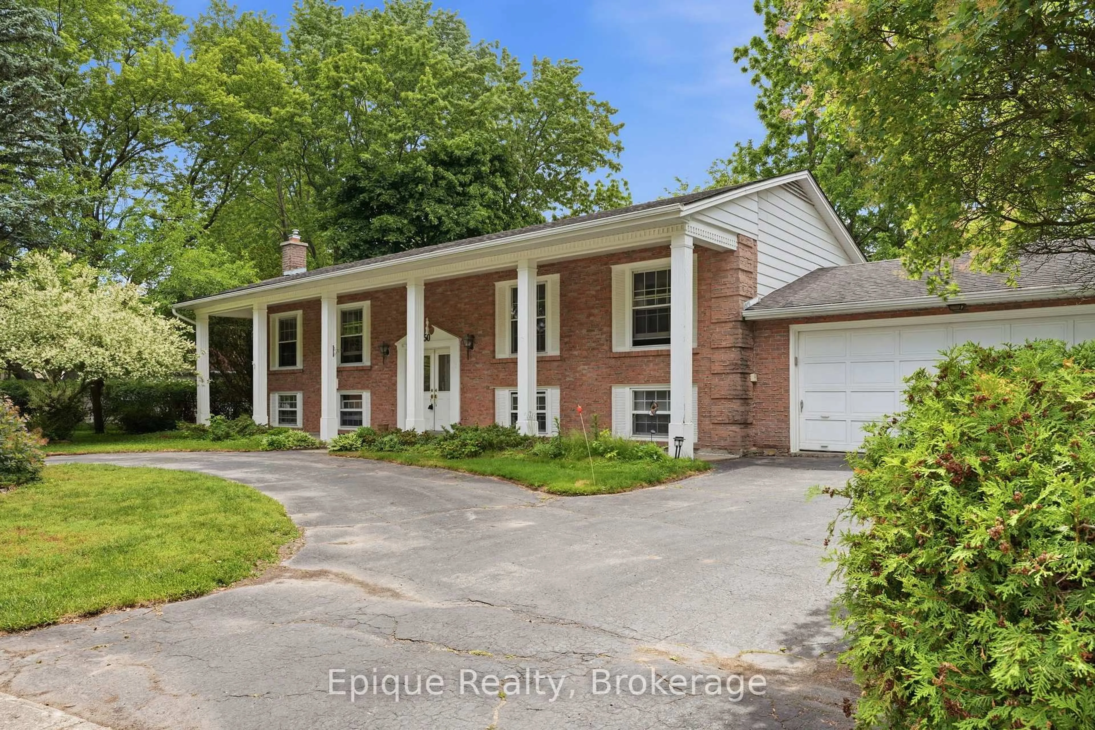 Home with brick exterior material, street for 50 Combermere Cres, Waterloo Ontario N2L 5B1