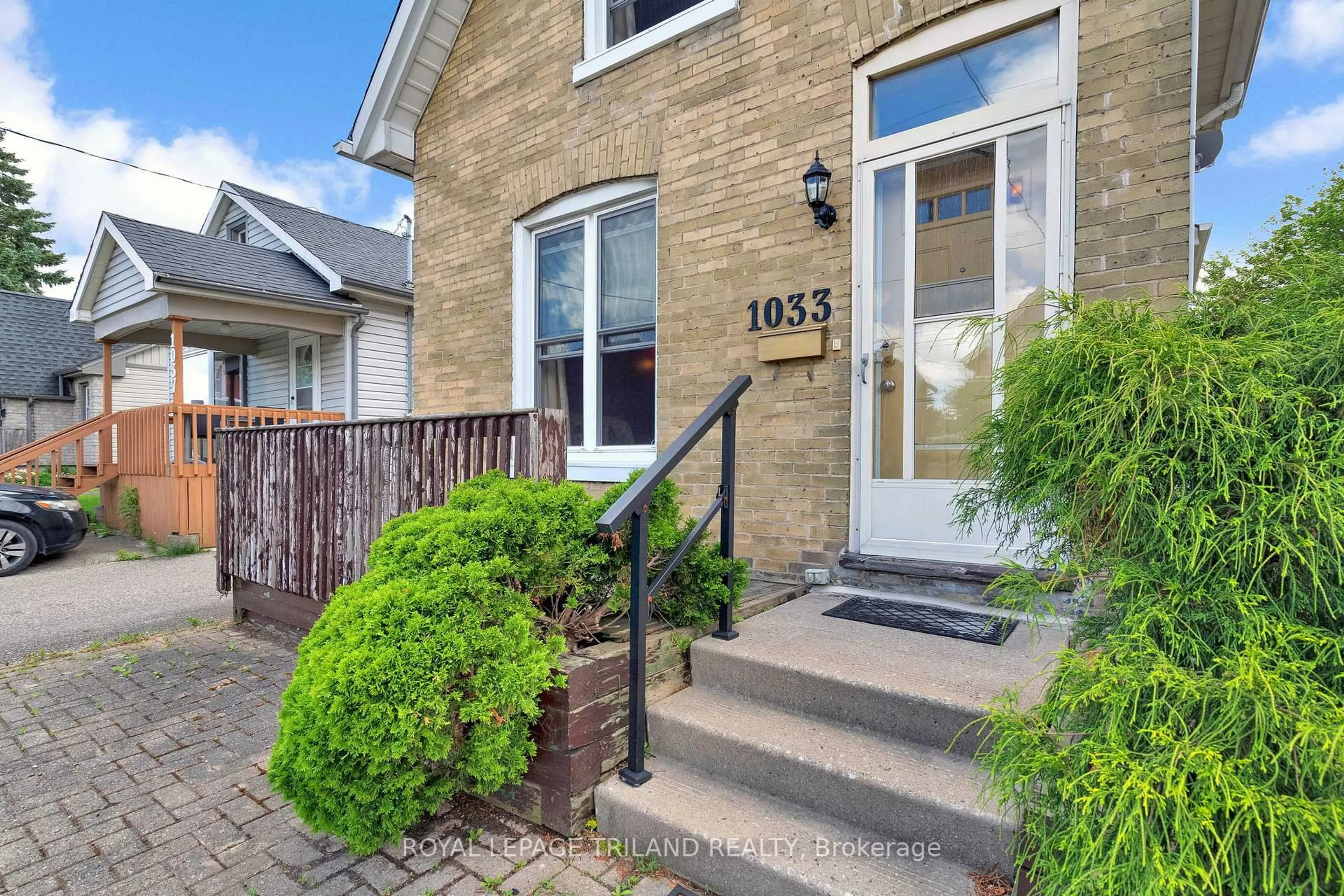Home with brick exterior material, street for 1033 Trafalgar St, London East Ontario N5Z 1G5