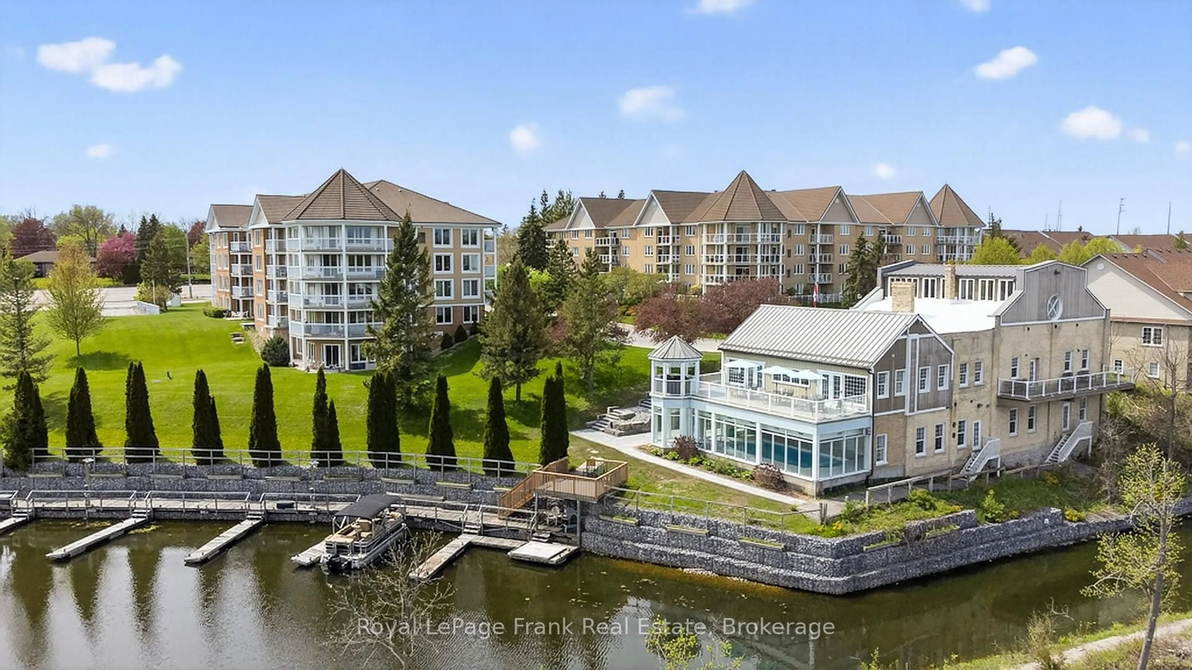 A pic from outside/outdoor area/front of a property/back of a property/a pic from drone, water/lake/river/ocean view for 51 Rivermill Blvd #407, Kawartha Lakes Ontario K9V 6K6