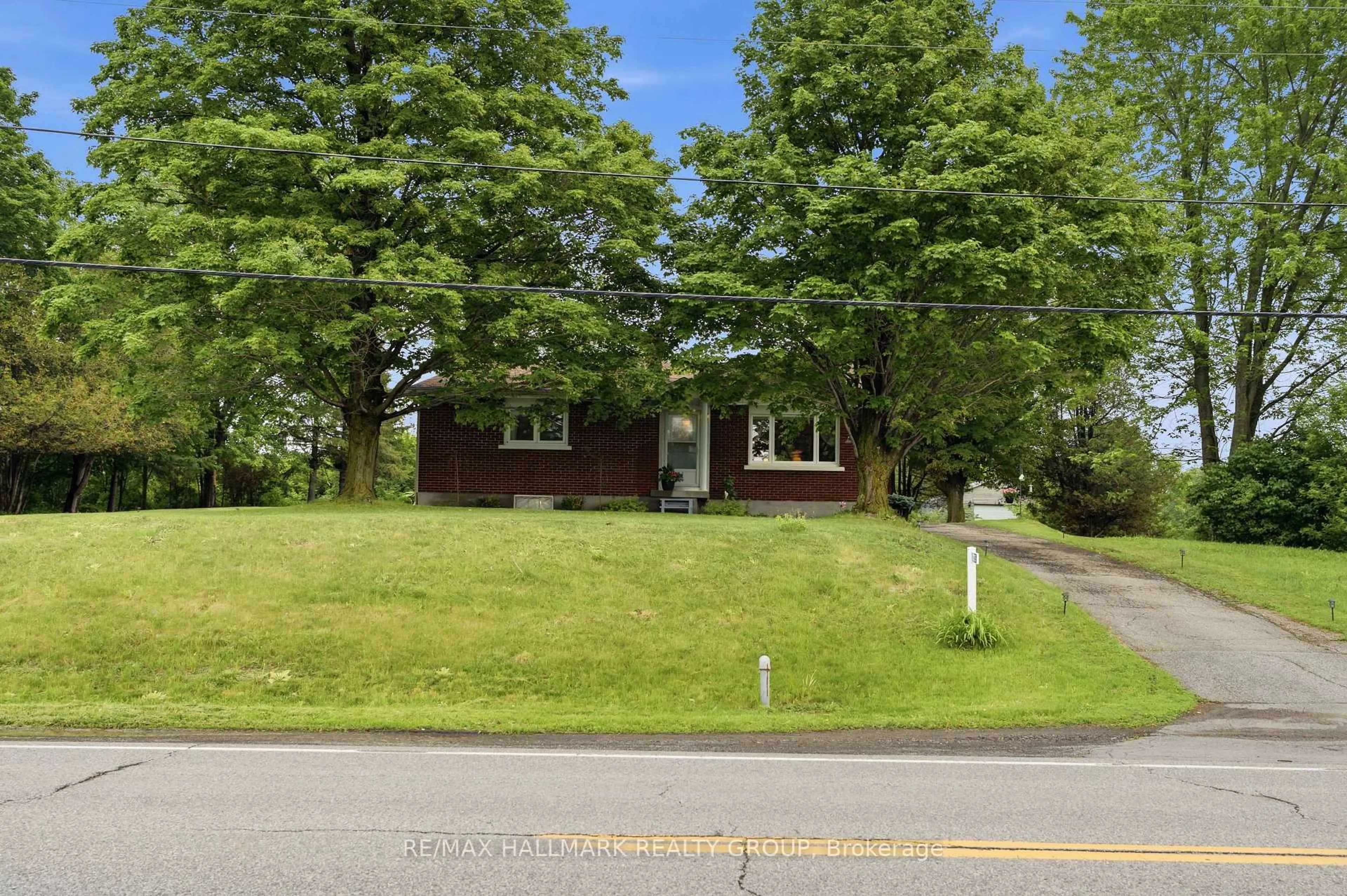 A pic from outside/outdoor area/front of a property/back of a property/a pic from drone, street for 3735 Highway 34, Champlain Ontario K0B 1R0