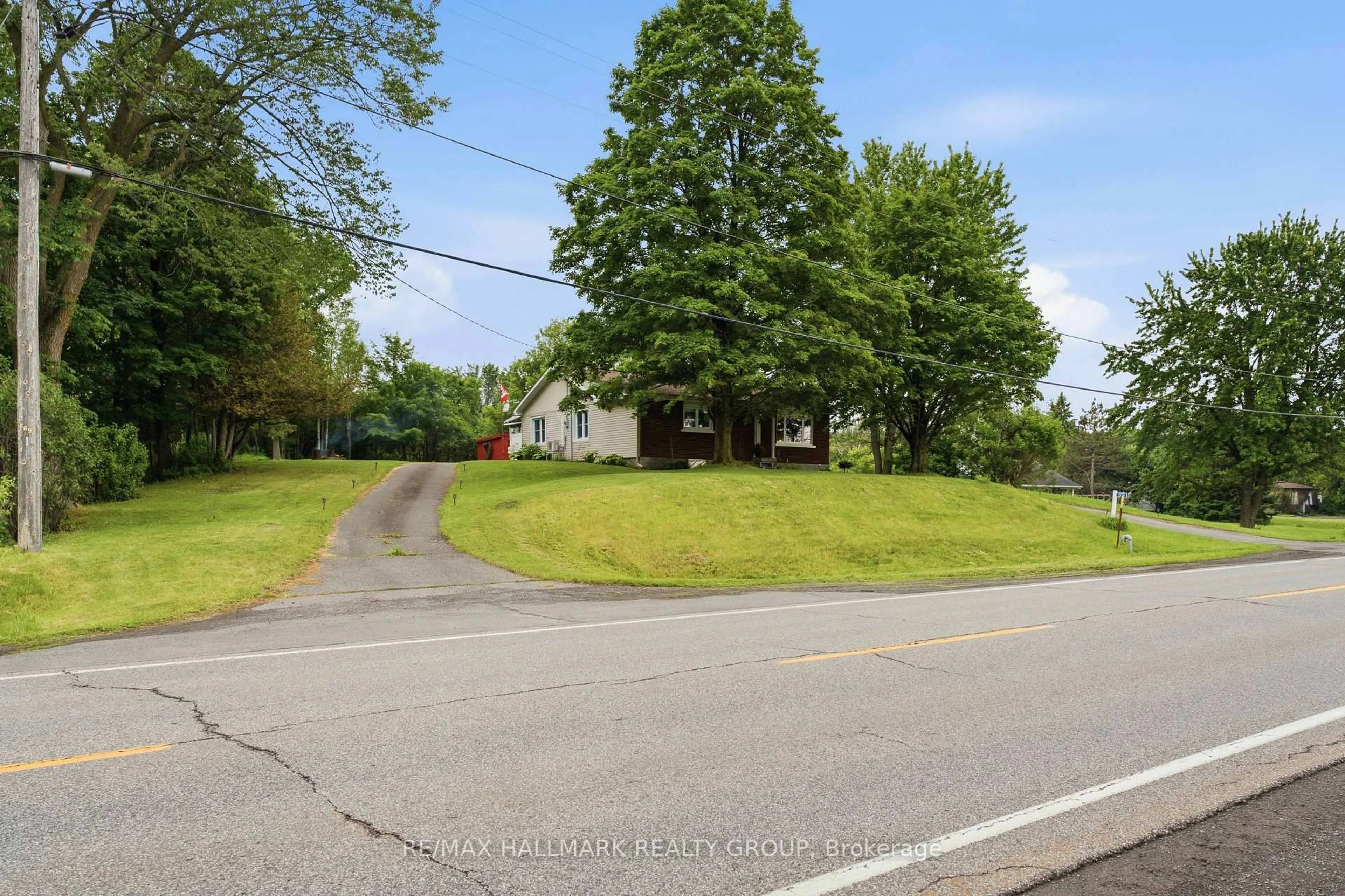 A pic from outside/outdoor area/front of a property/back of a property/a pic from drone, street for 3735 Highway 34, Champlain Ontario K0B 1R0