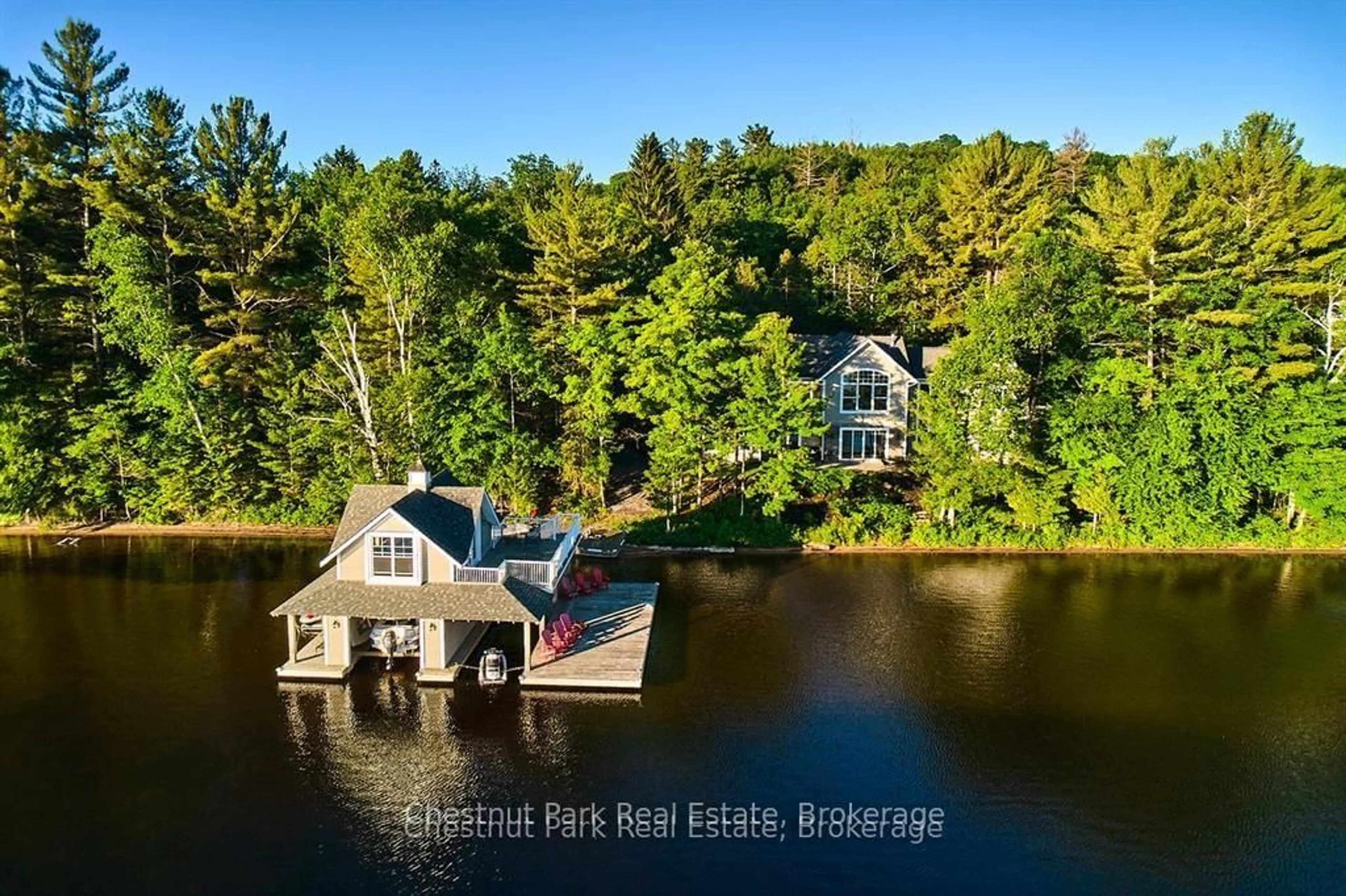 A pic from outside/outdoor area/front of a property/back of a property/a pic from drone, water/lake/river/ocean view for 624 Muskoka Road 10, Huntsville Ontario P0B 1L0