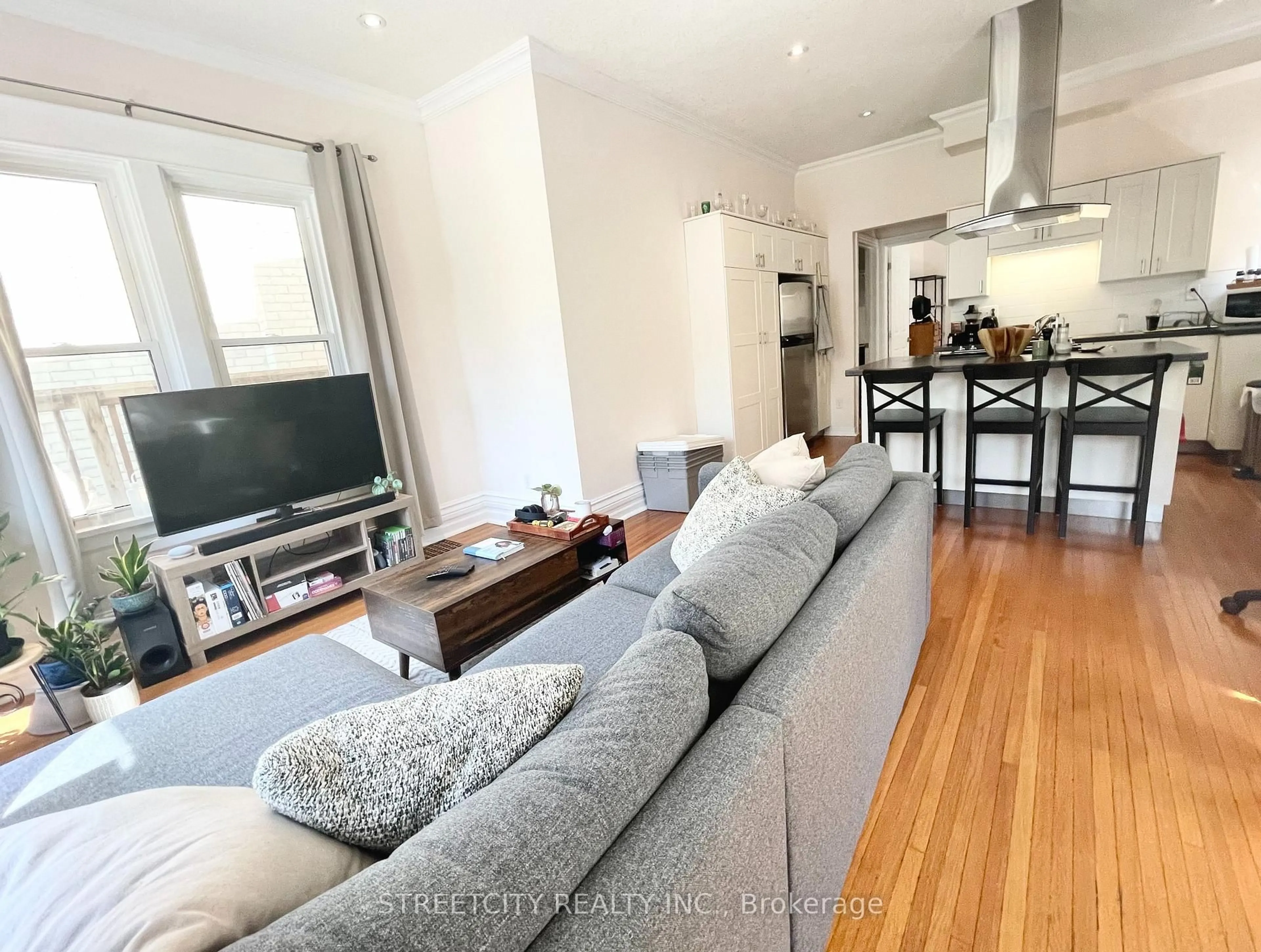 Living room with furniture, wood/laminate floor for 6 Victor St, London South Ontario N6C 1B7